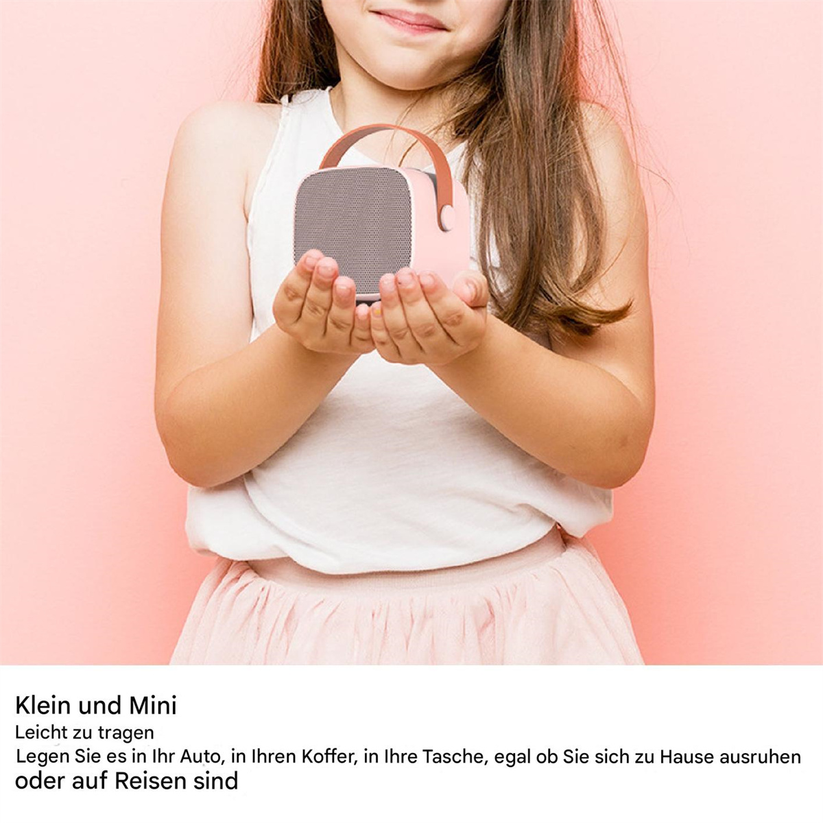 Ein Mädchen hält einen kleinen rosa Lautsprecher. Text auf Deutsch erklärt die Tragbarkeit und Größe des Lautsprechers.