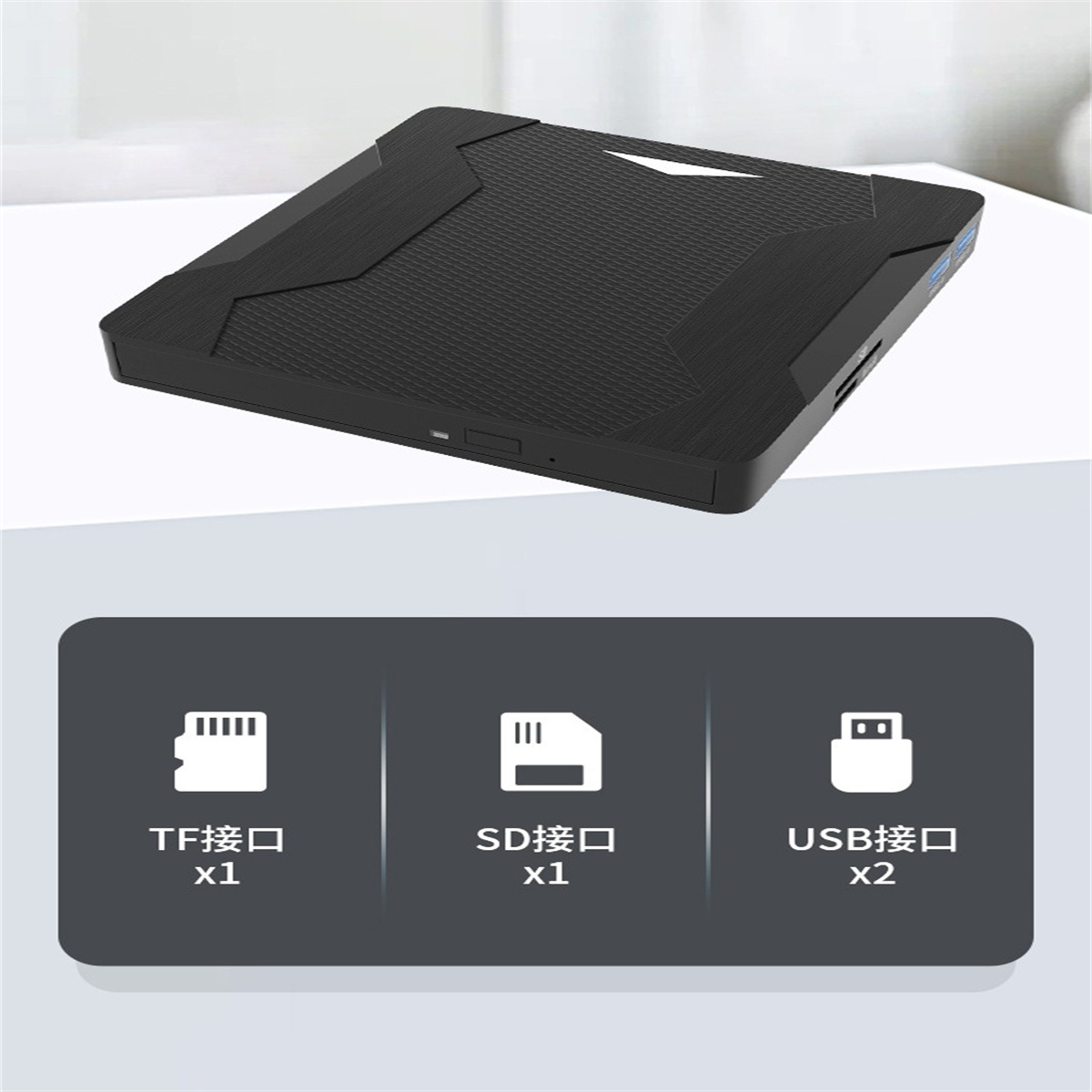 Eine schwarze Box mit einzigartigem Design und mehreren Anschlüssen (TF, SD, USB) auf weißer Oberfläche.