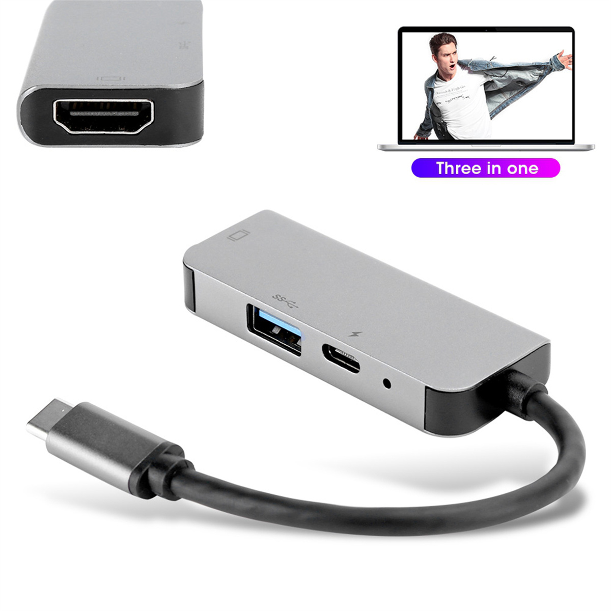 Silberner Hub mit USB-, HDMI- und USB-C-Anschlüssen, Laptop mit Bild eines Mannes.