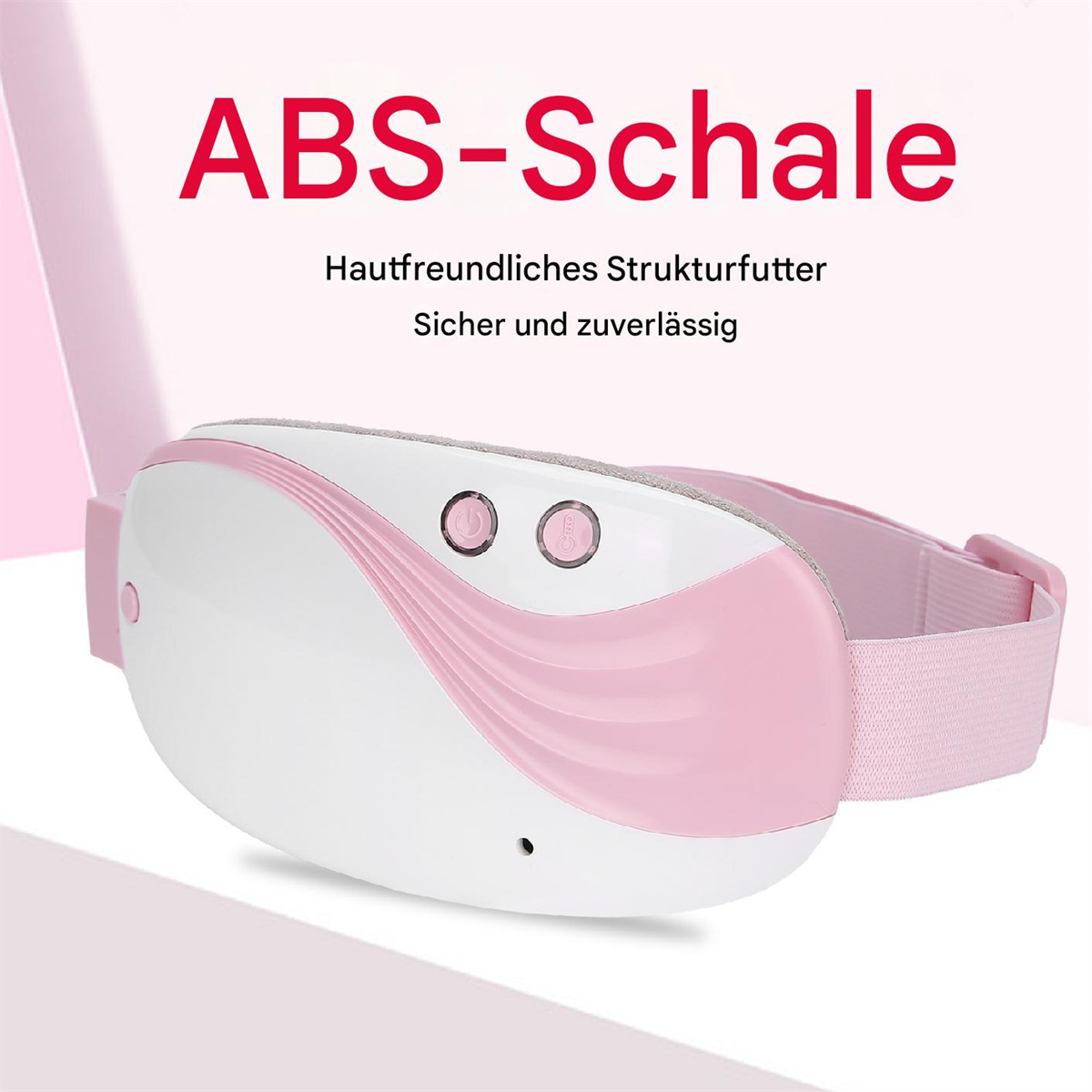 Ein rosa-weißer Augenmassager mit zwei Knöpfen und einem Riemen.