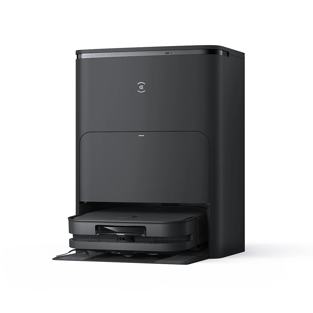 Czarny robot sprzątający ze stacją ładującą. Białe tło.