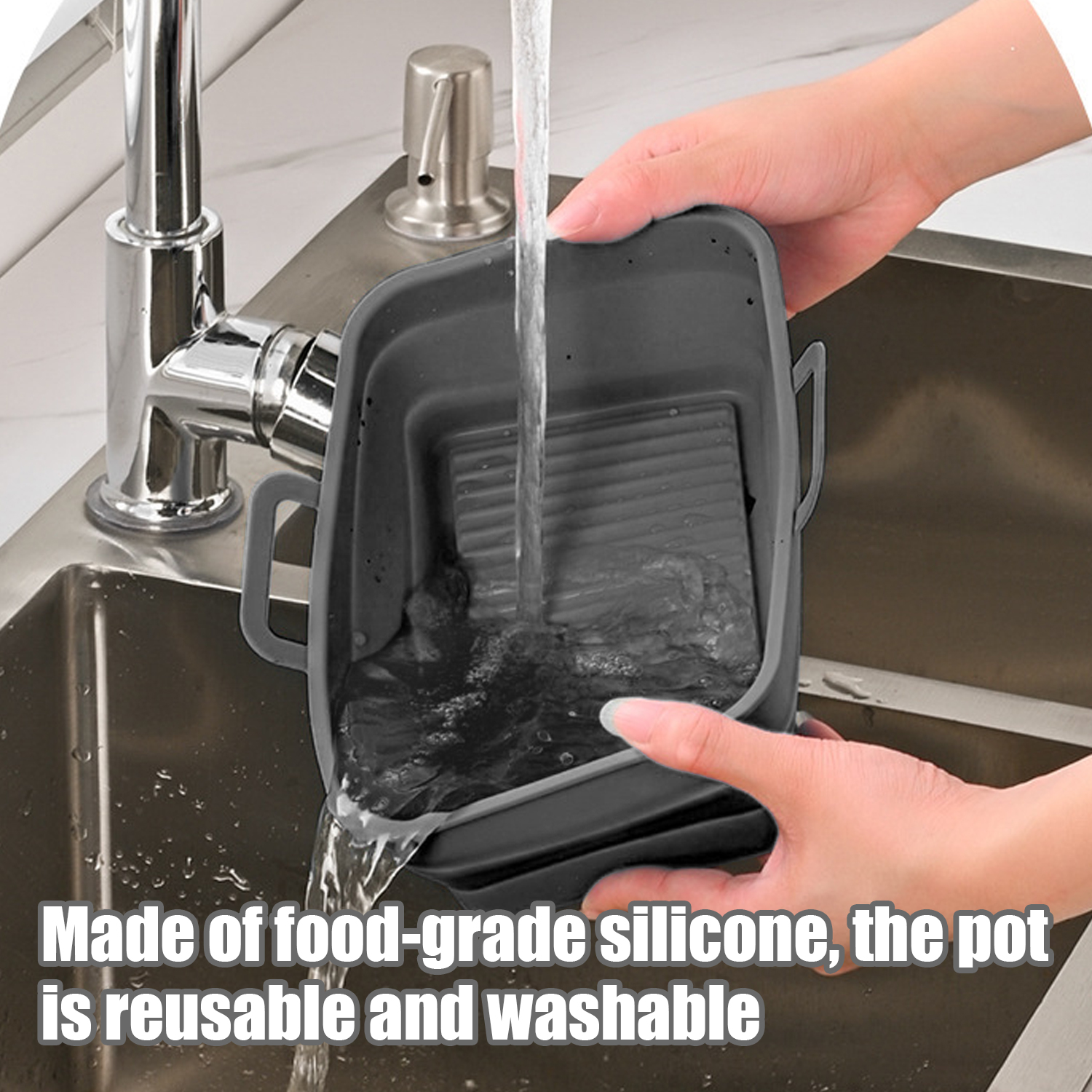 A gray silicone pot being washed in a sink. Water is pouring into the pot.