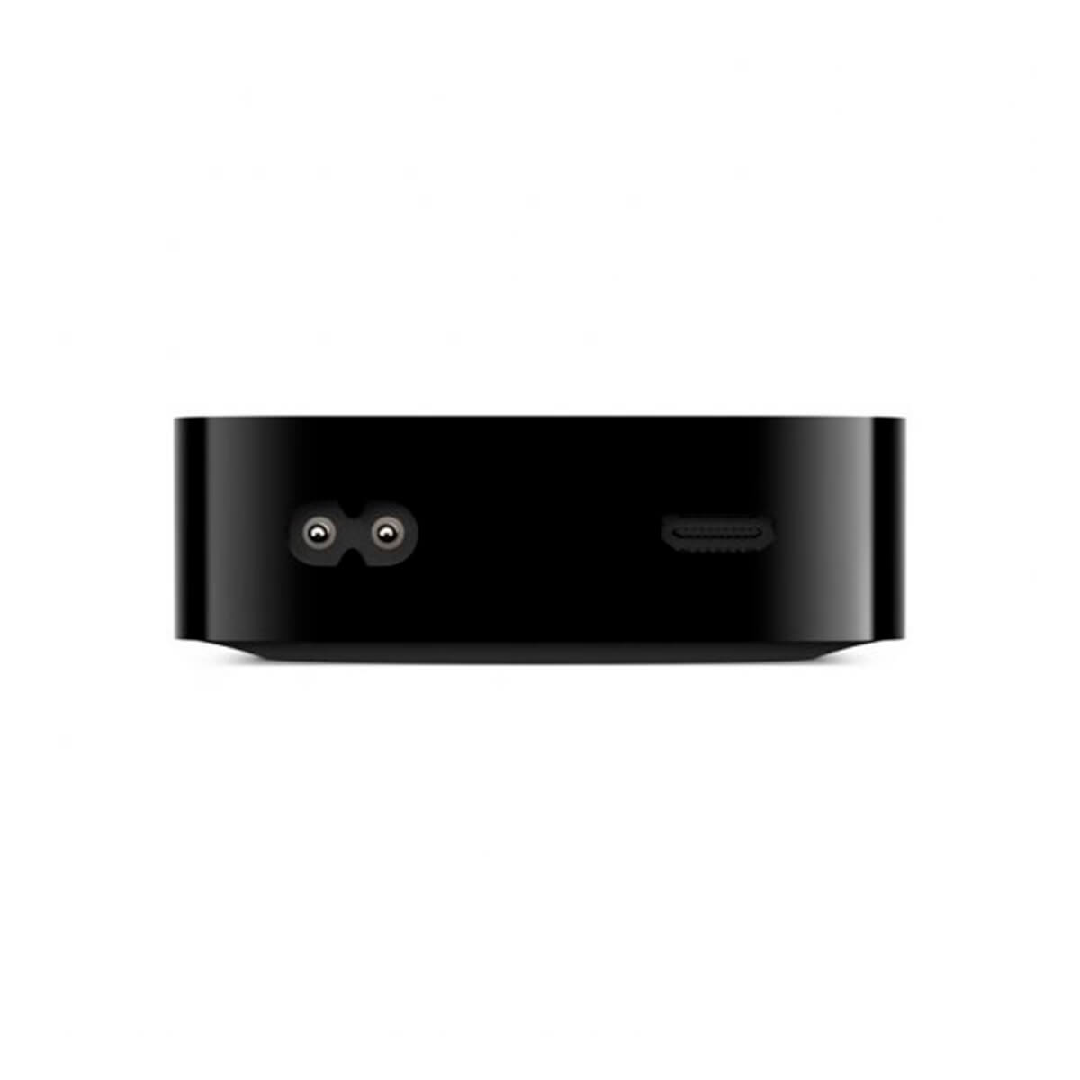 Schwarzes Apple TV Gerät. Zeigt Strom- und HDMI-Anschlüsse.