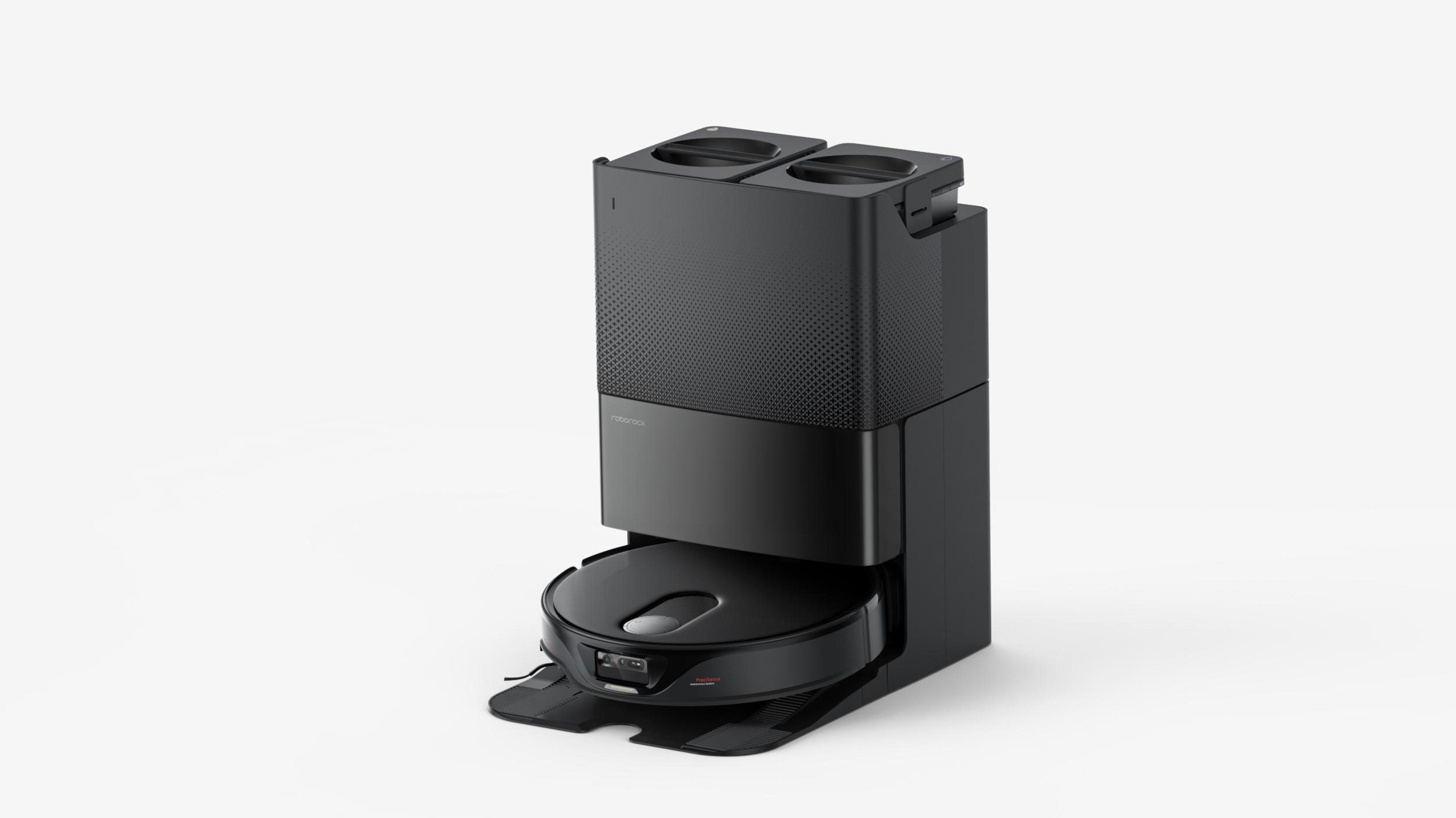 Biały robot sprzątający Roborock, widok z góry na białym tle.