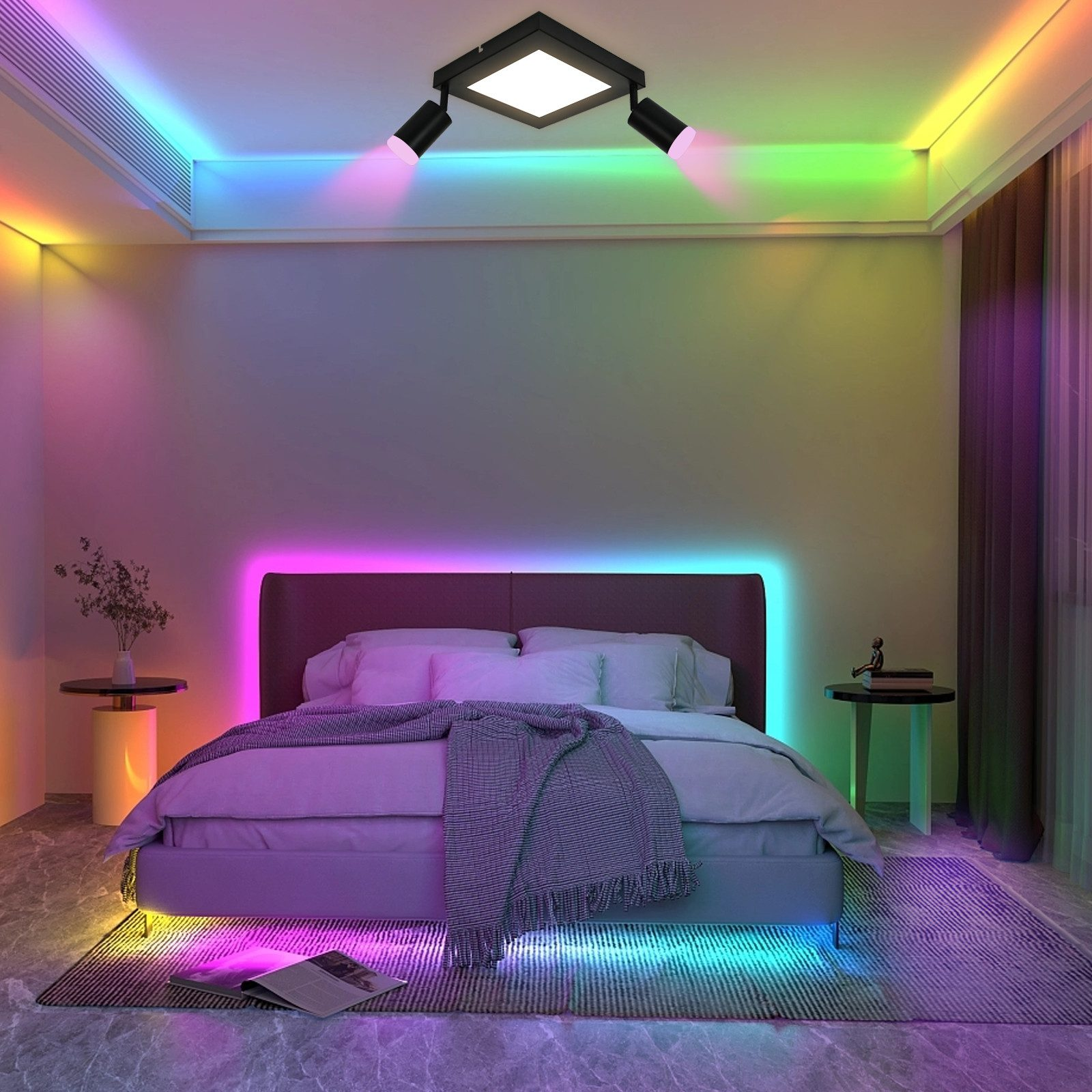 Camera da letto con letto, luci colorate e tappeto. Luci installate sul soffitto, sulla struttura del letto e sul pavimento.