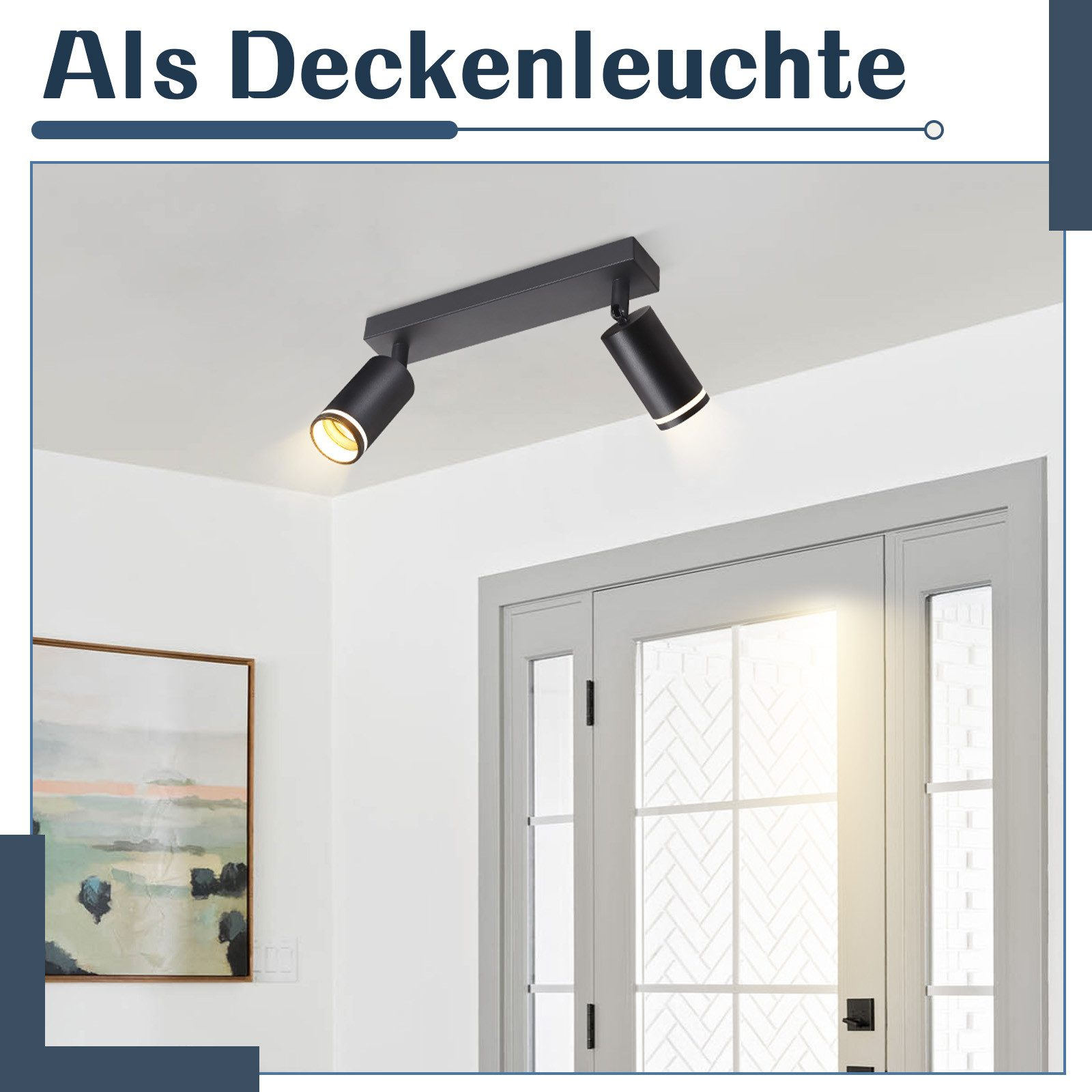 Zwei schwarze Strahler auf einer Schiene an einer weißen Decke.