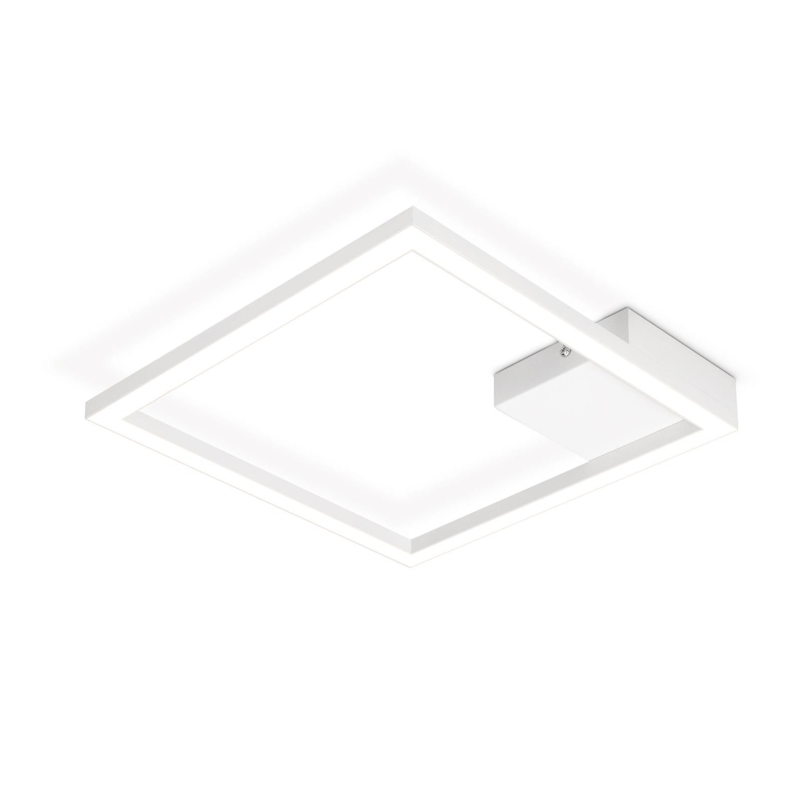 Lampada da soffitto quadrata bianca. Lo sfondo è bianco.