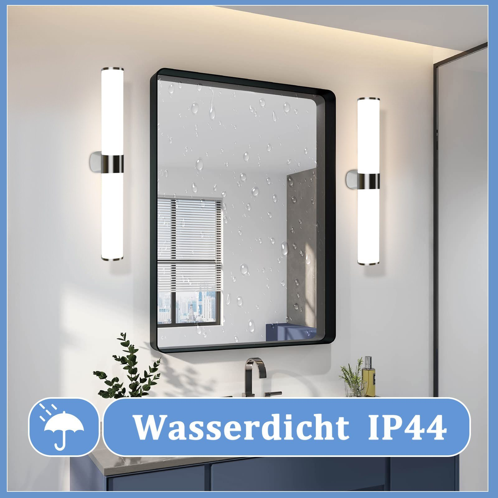 Uno specchio del bagno con luci e un'etichetta idrorepellente. Gocce d'acqua appaiono sulla superficie dello specchio.