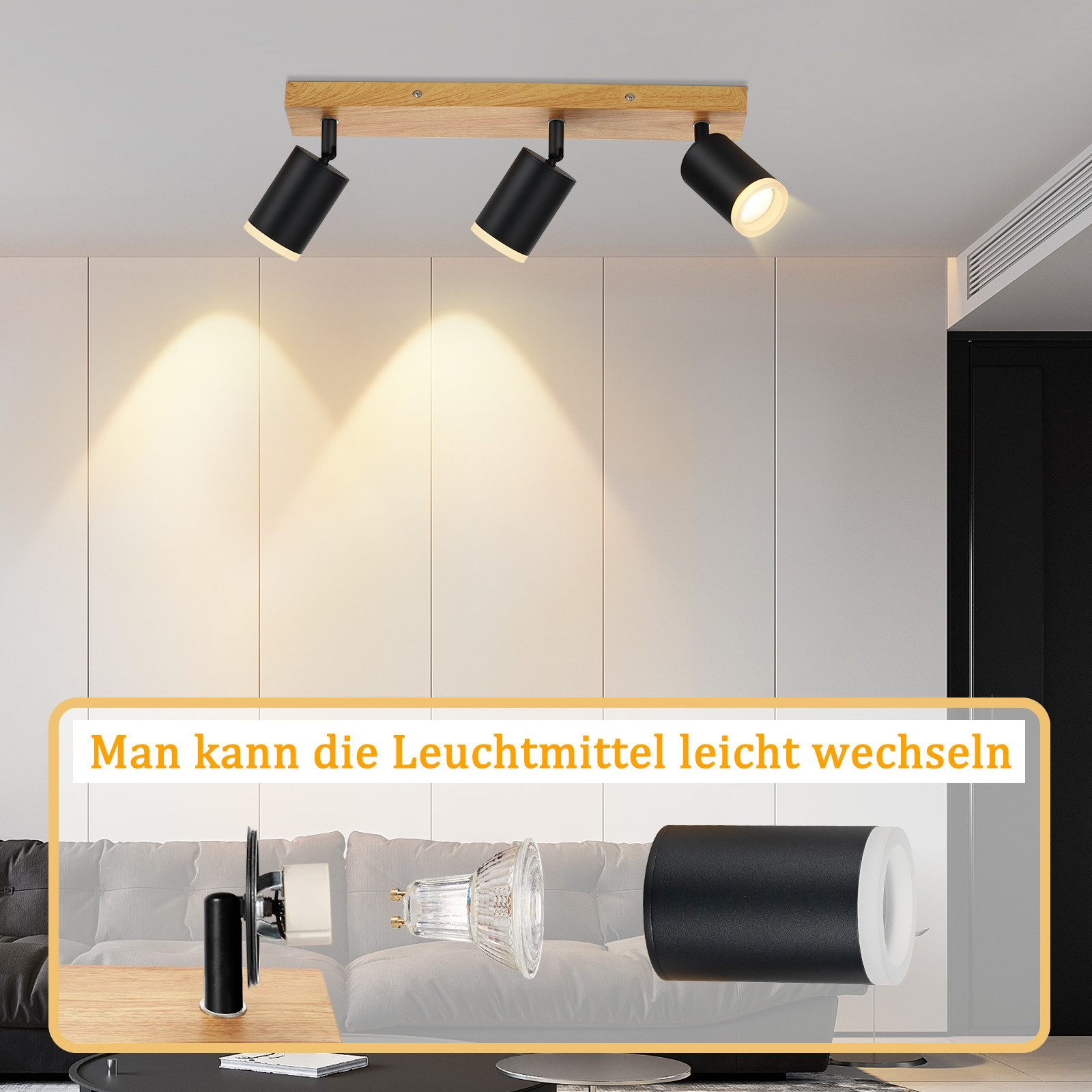 Faretto da soffitto: tre luci nere su una trave di legno. Le luci sono accese, illuminando l'area.