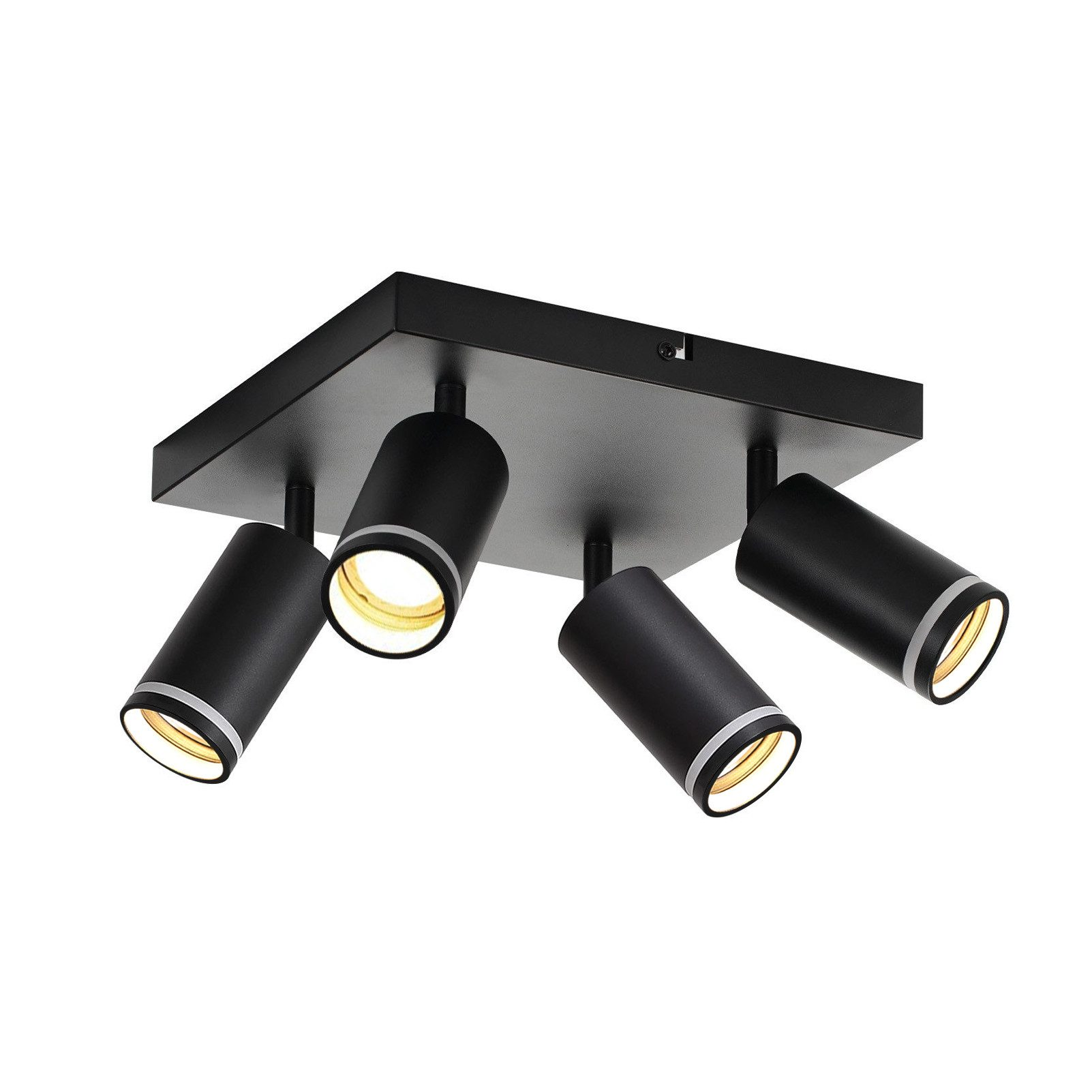 Lampada da soffitto nera con quattro faretti orientabili. Ogni faretto è cilindrico e ha un bordo argentato.