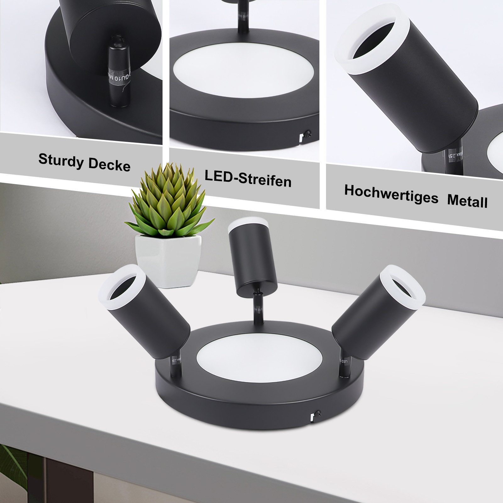 Lampada da soffitto nera con tre faretti regolabili. Davanti c'è una piccola pianta.