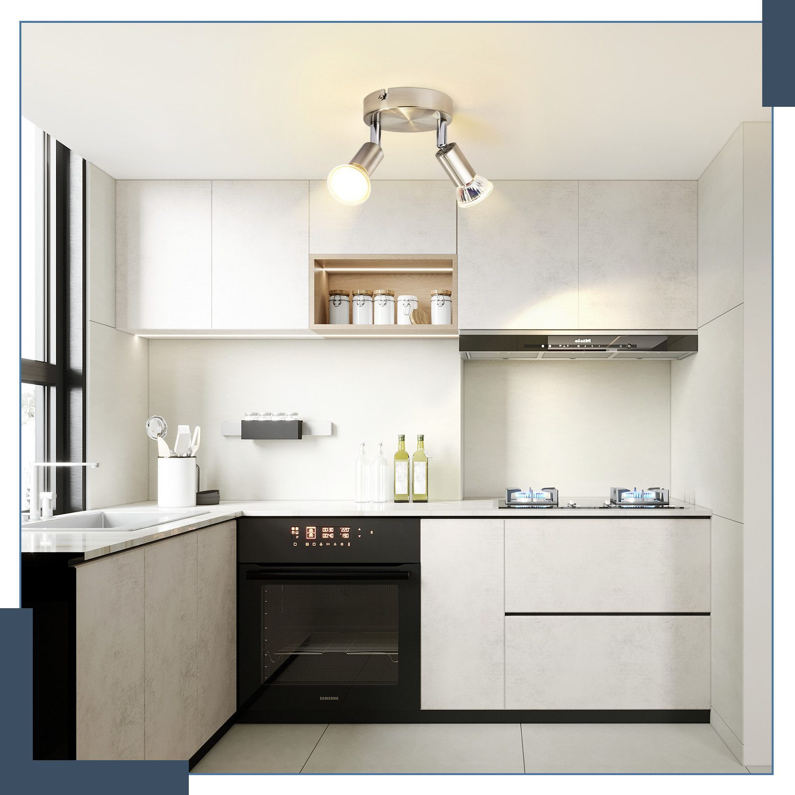 Cucina moderna con mobili bianchi, elettrodomestici in acciaio inox e due faretti a soffitto.