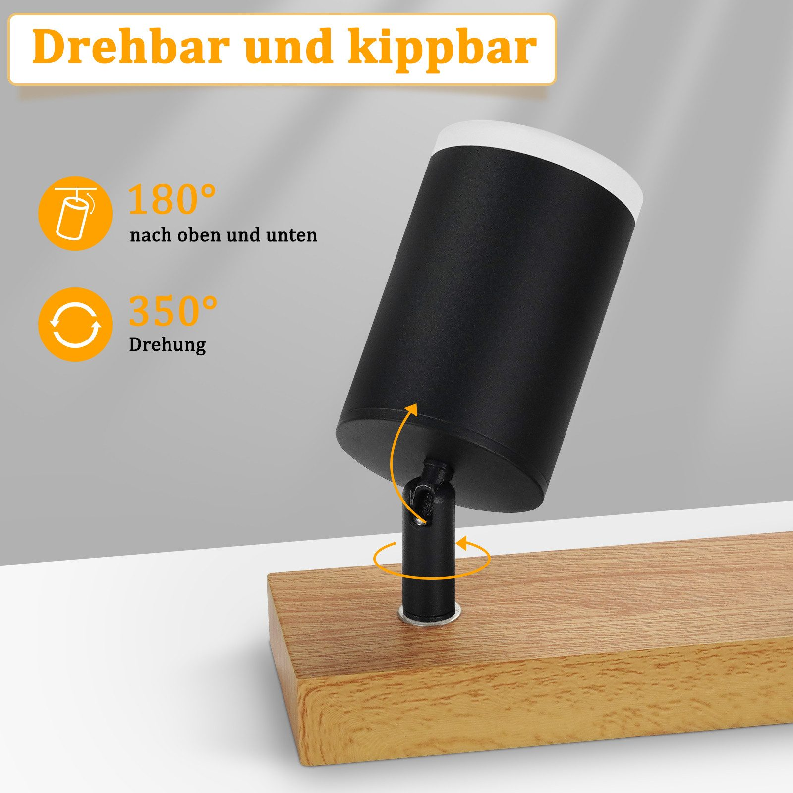 Czarno-biały regulowany reflektor na drewnianej powierzchni, pokazujący możliwości obrotu i pochylenia.