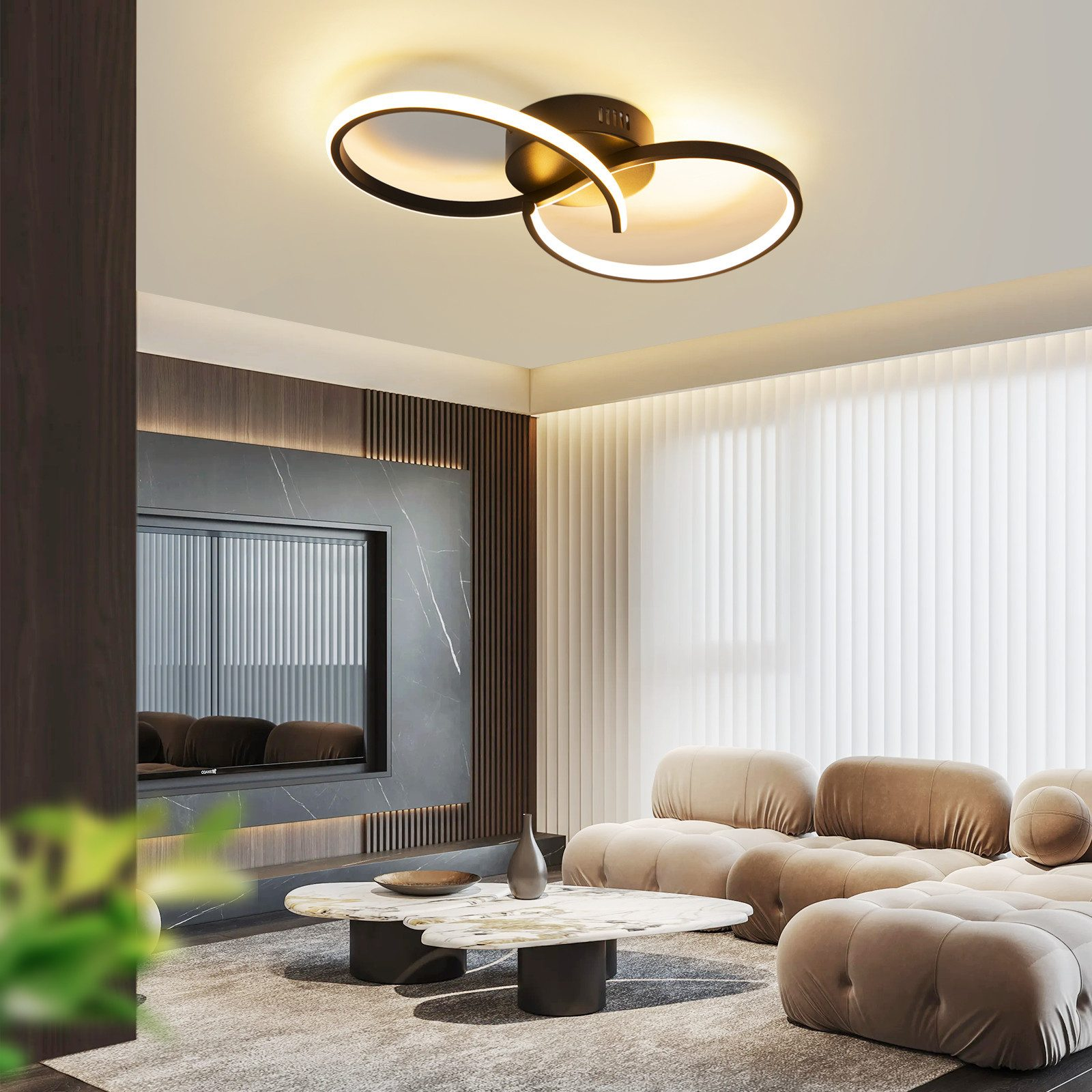 Nowoczesna lampa sufitowa z dwoma okrągłymi elementami świetlnymi, w salonie.