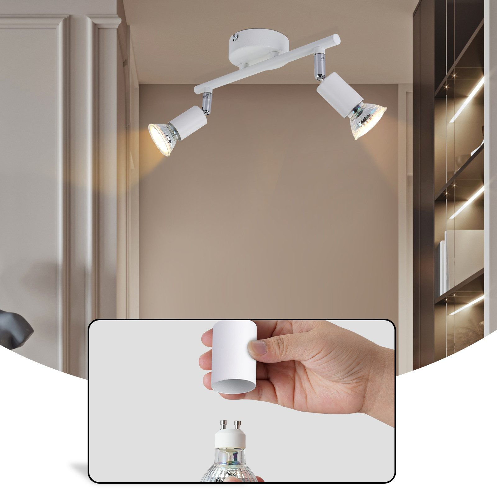 Biała lampa szynowa z dwoma regulowanymi reflektorami i dłonią trzymającą żarówkę.