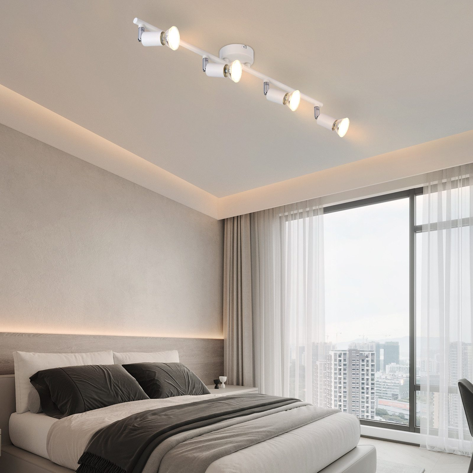 Una plafoniera con più faretti in una camera da letto, che mostra l'illuminazione.