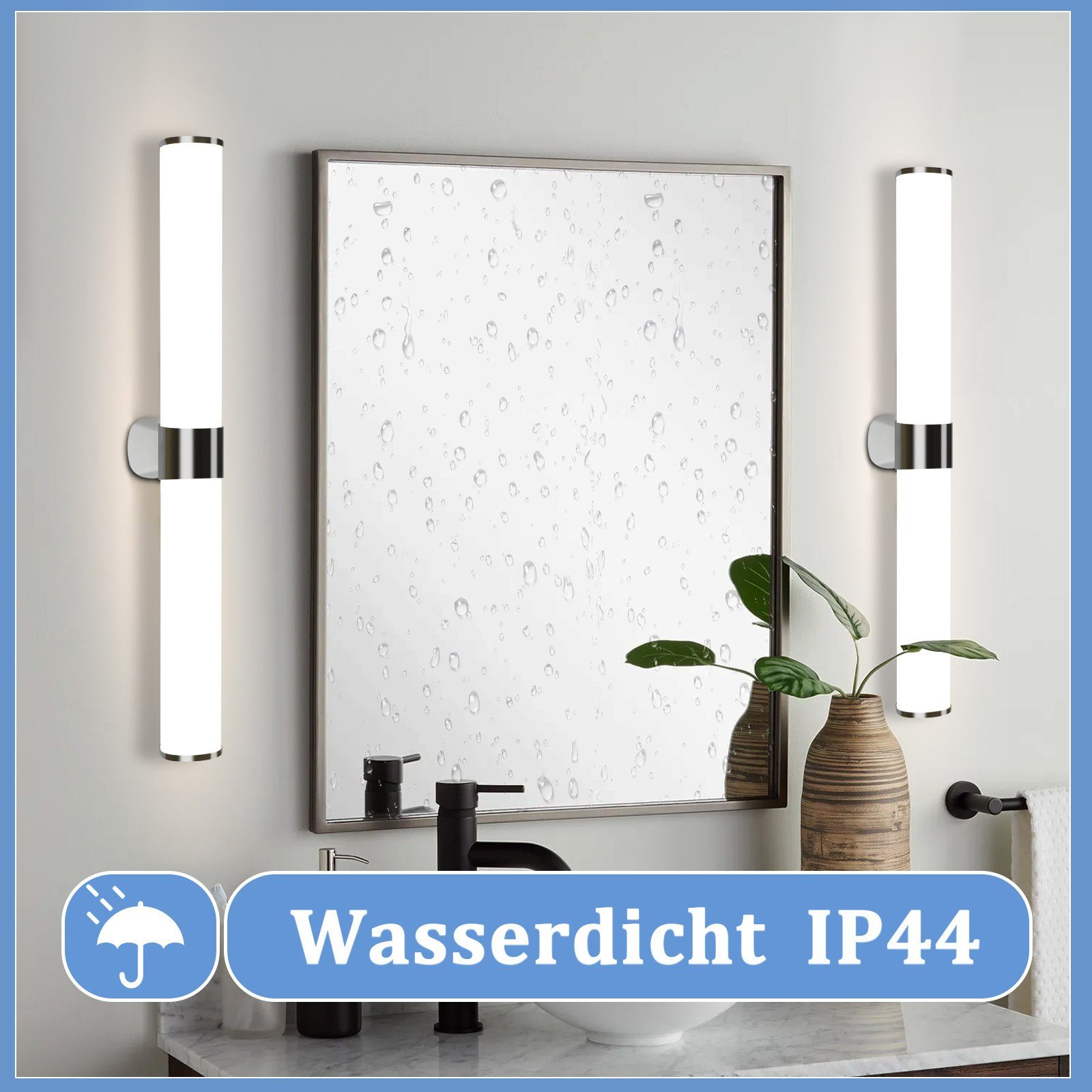 Bagno con luci IP44 impermeabili, due luci verticali ai lati di uno specchio e un lavandino.