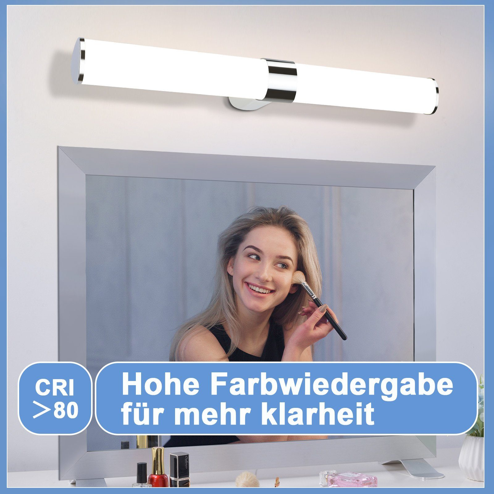 Una donna si trucca davanti a uno specchio con una lunga e luminosa luce da bagno a LED.