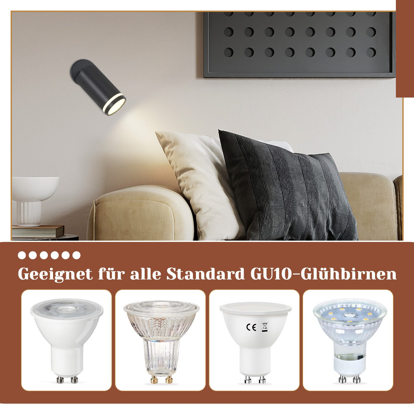Quattro lampadine GU10 e un faretto nero, con un divano e un muro sullo sfondo.