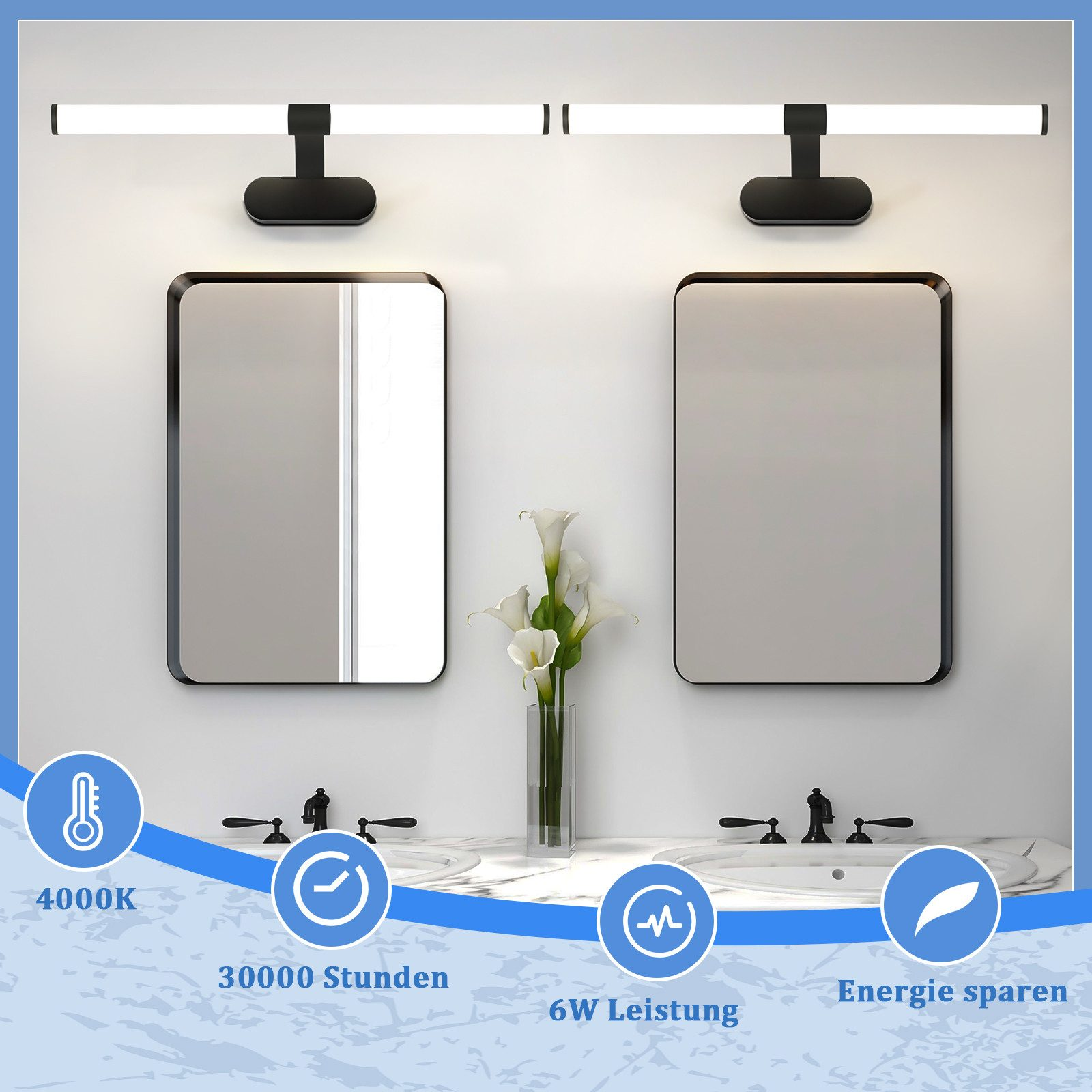 Due specchi da toeletta con luci a LED e un vaso di fiori sono mostrati in un ambiente bagno.