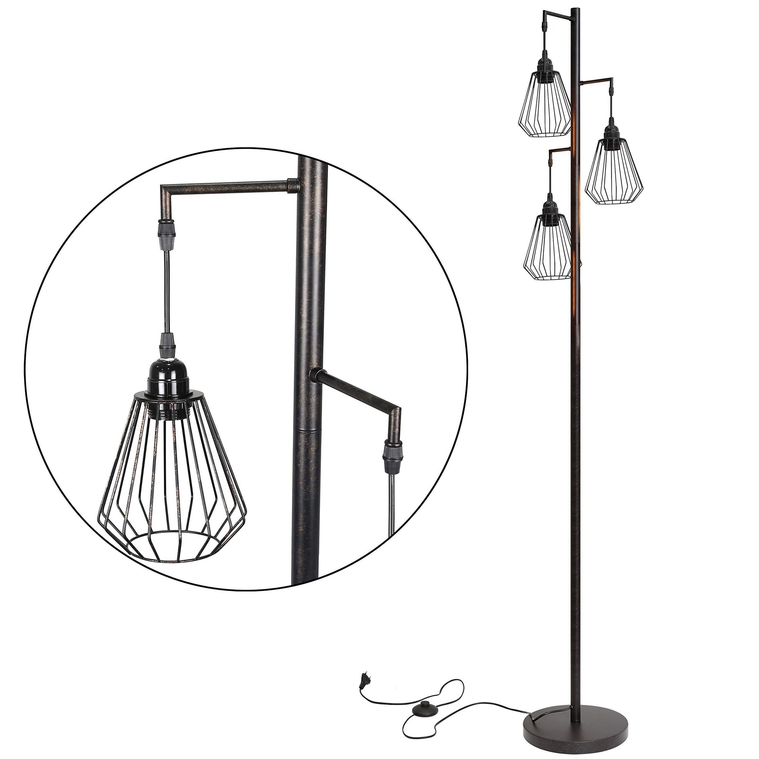 Una lampada da terra color bronzo con tre luci a gabbia. Un primo piano mostra una luce.