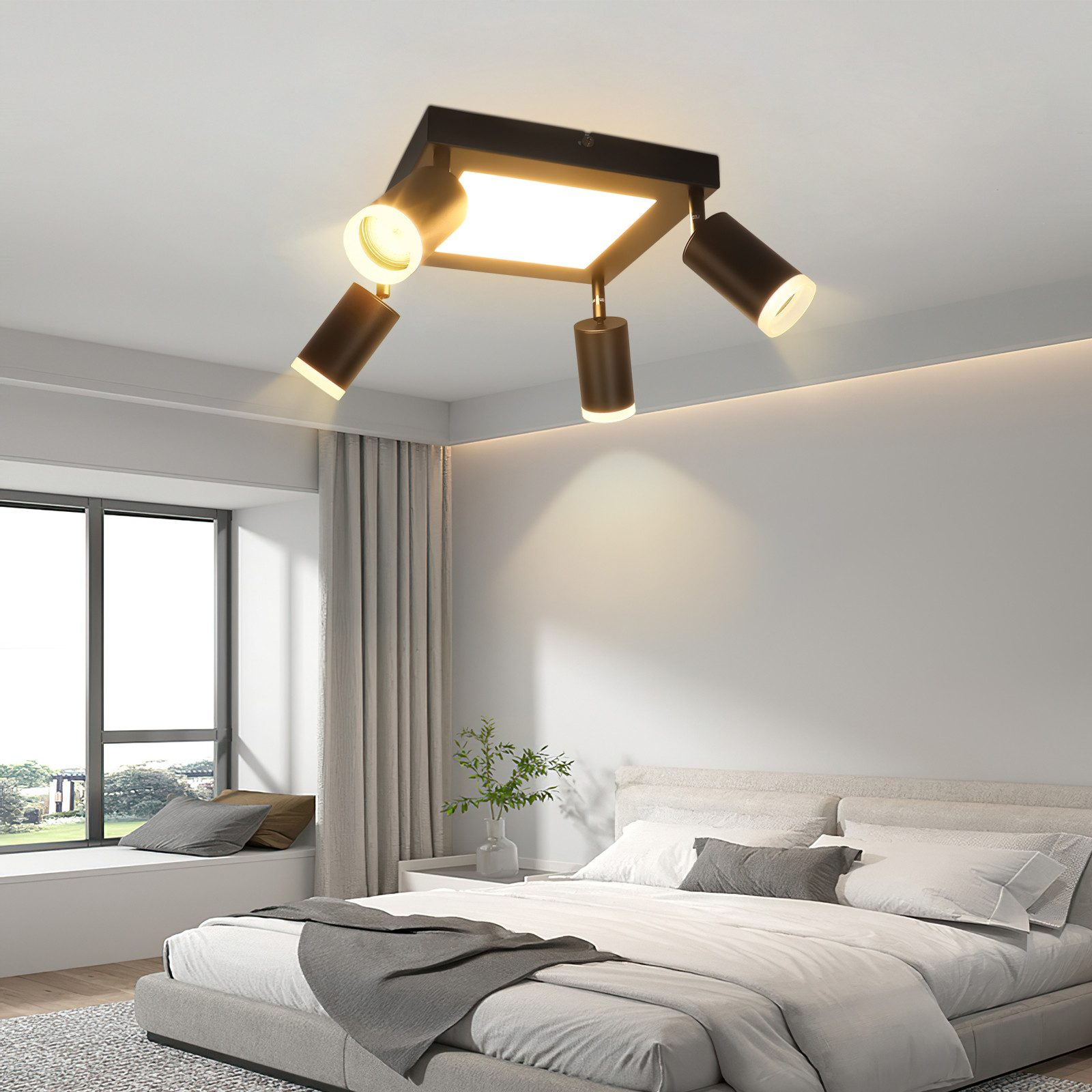 Nowoczesna lampa sufitowa z regulowanymi reflektorami w pokoju.