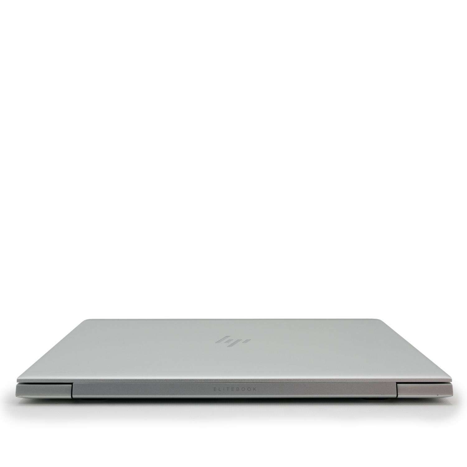 Silberner Laptop, geschlossen. HP Elitebook Logo auf dem Deckel. Weißer Hintergrund.