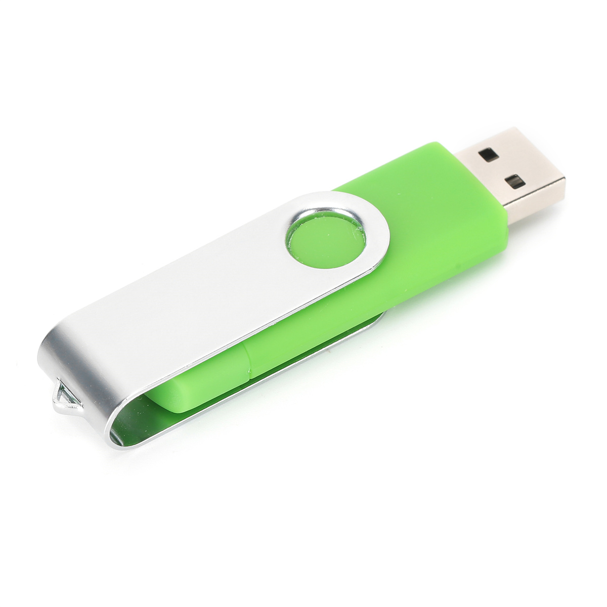 Ein grün-silberner USB-Stick mit Drehdesign, der auf einer weißen Oberfläche liegt.