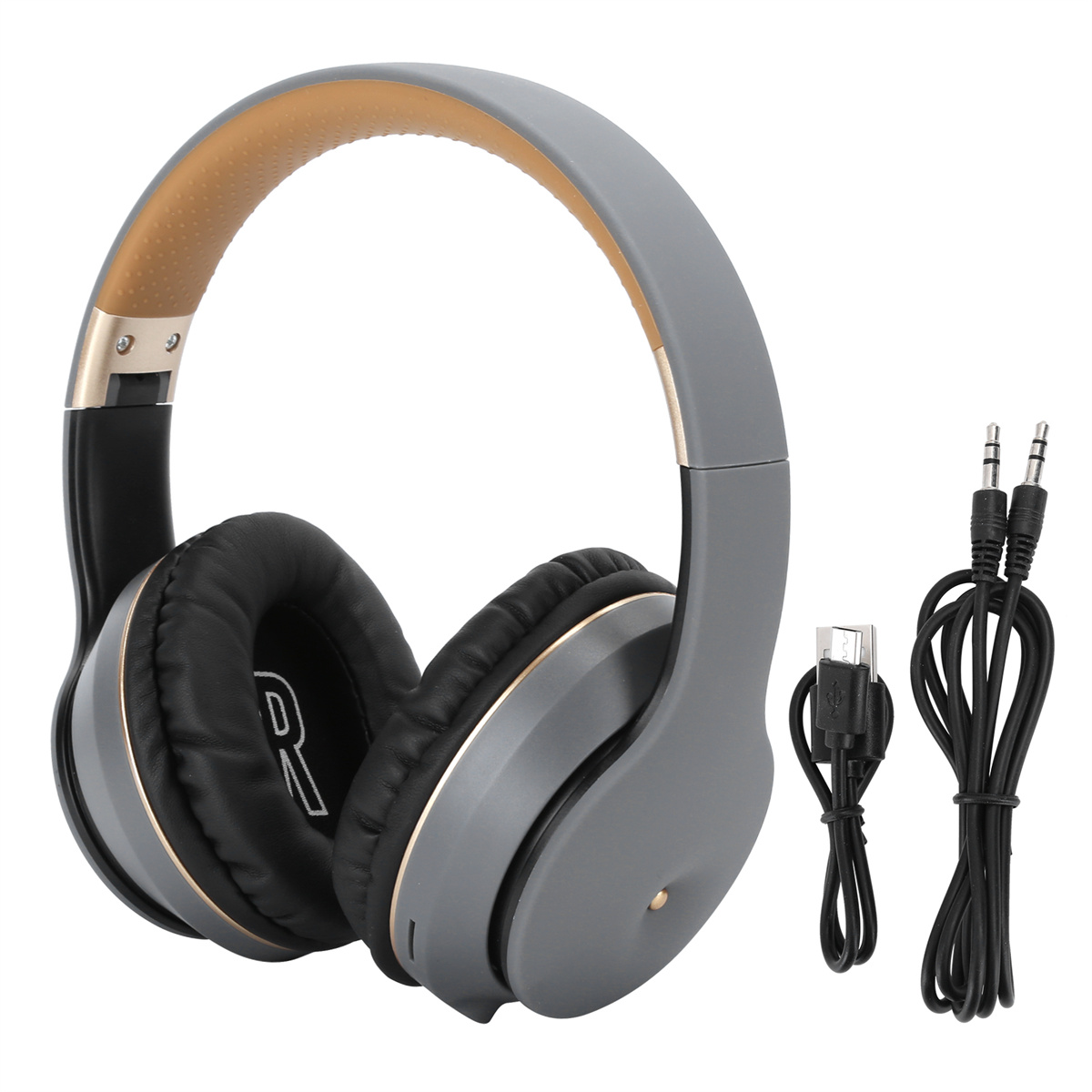 Grau-goldene Kopfhörer mit Kabel und Ladekabel. Die Ohrmuscheln sind sichtbar.