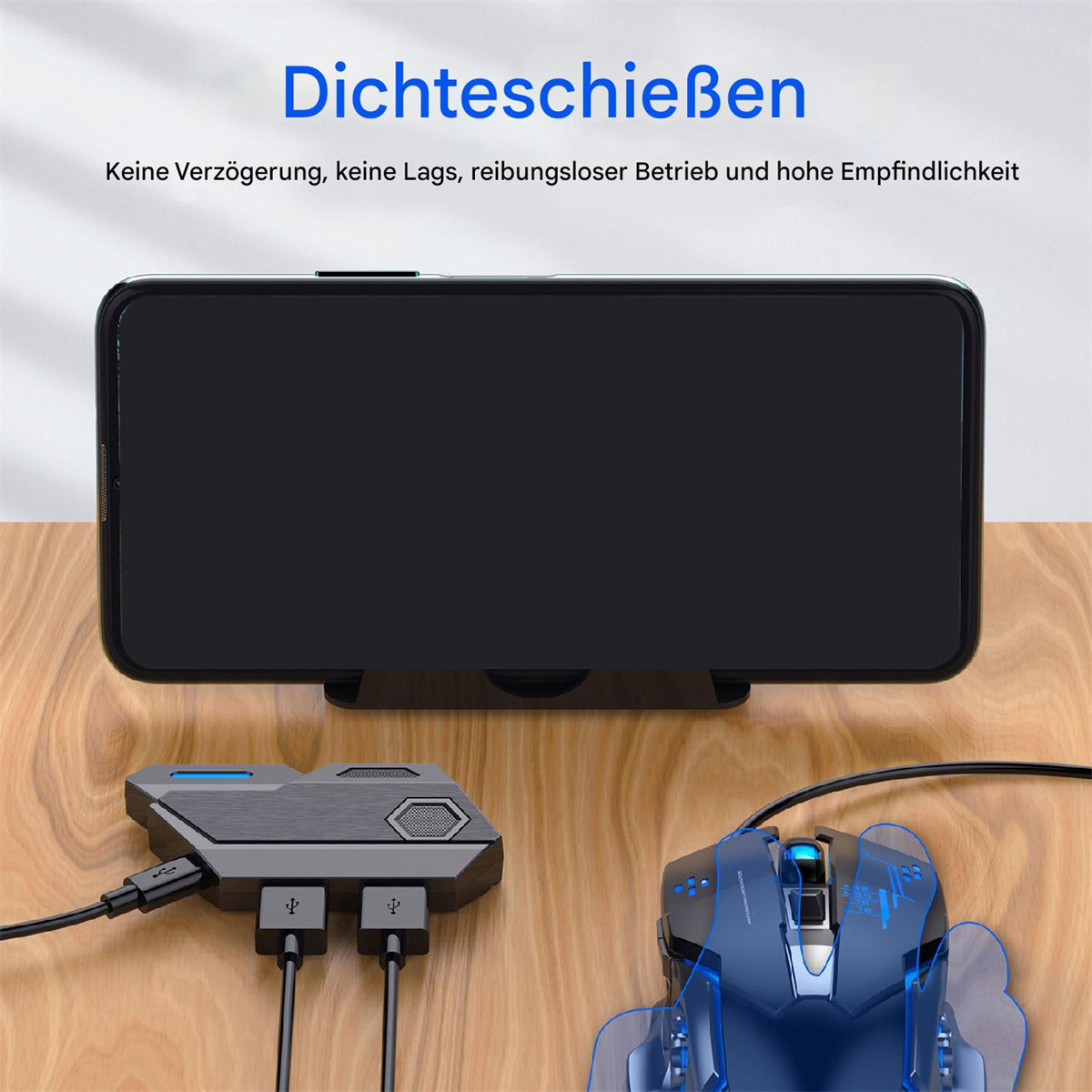 Ein Telefon und Zubehör auf einem Holztisch, darunter Maus und Hub.