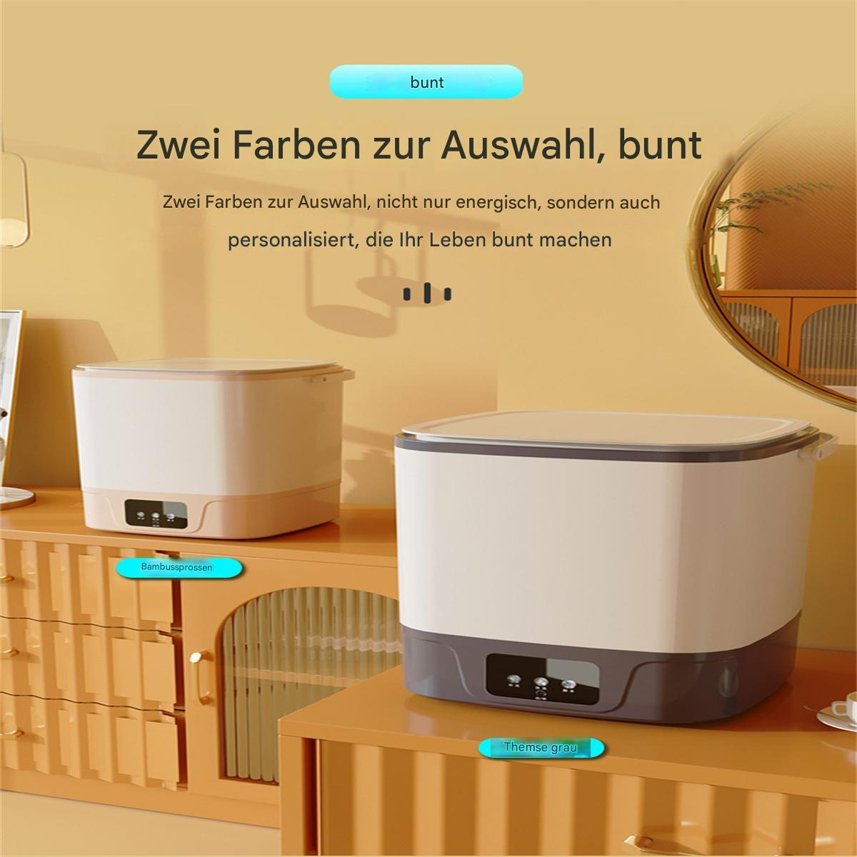 Zwei Küchengeräte, beige und grau, auf einem Holzschrank, mit Text auf Deutsch.