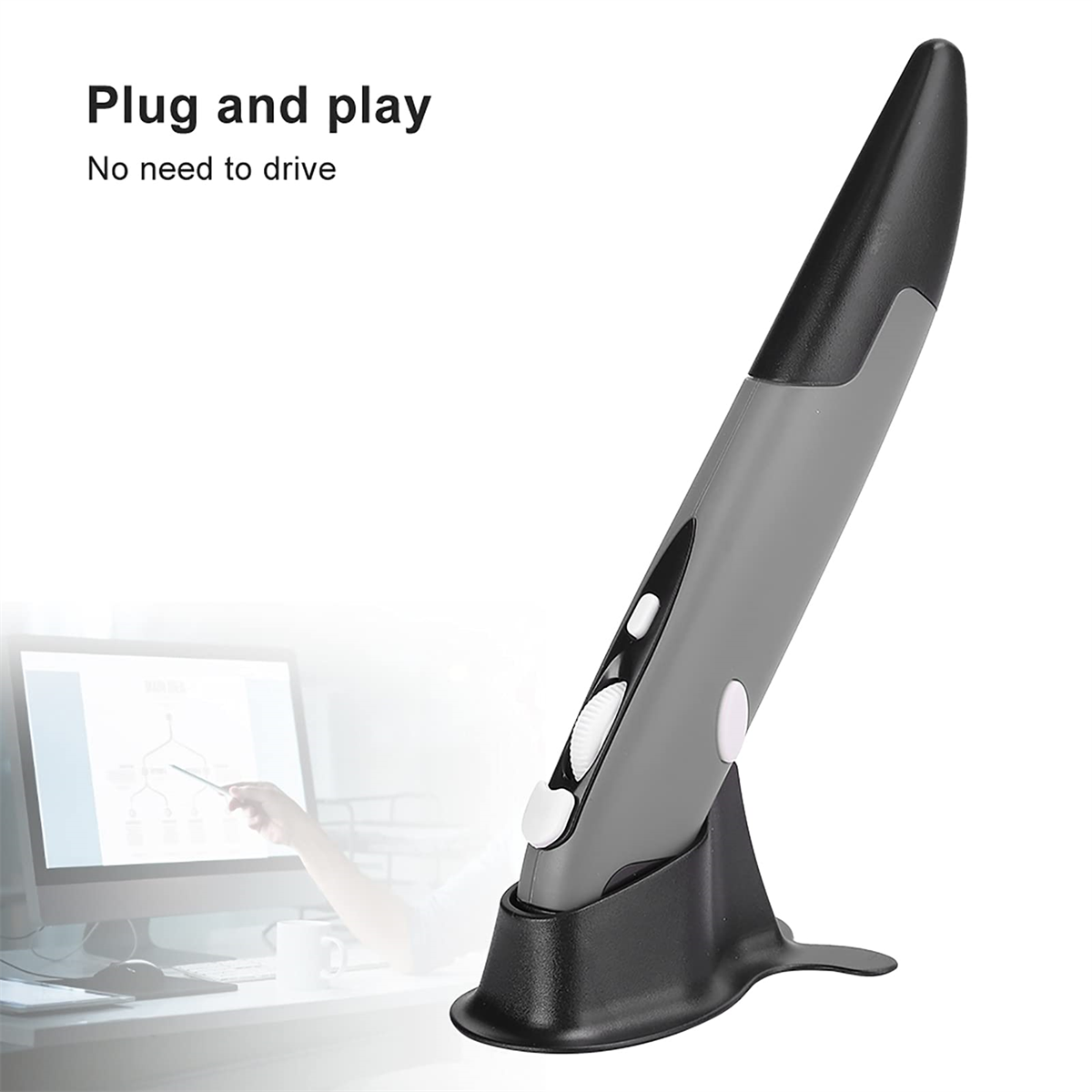 Eine graue, stiftförmige Computermaus auf schwarzem Sockel neben einem Computerbildschirm.