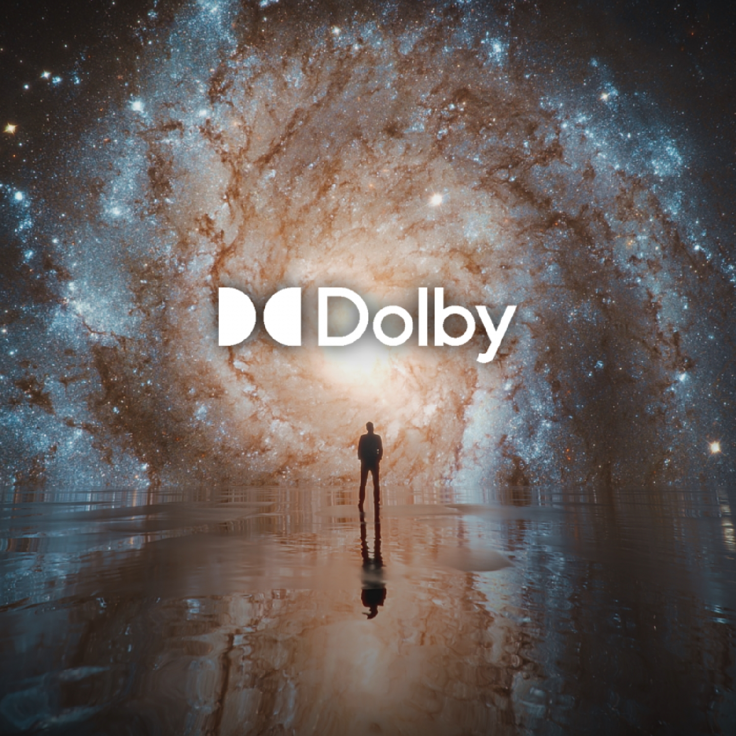 Persona de pie frente a una galaxia, con el logo de Dolby en primer plano.