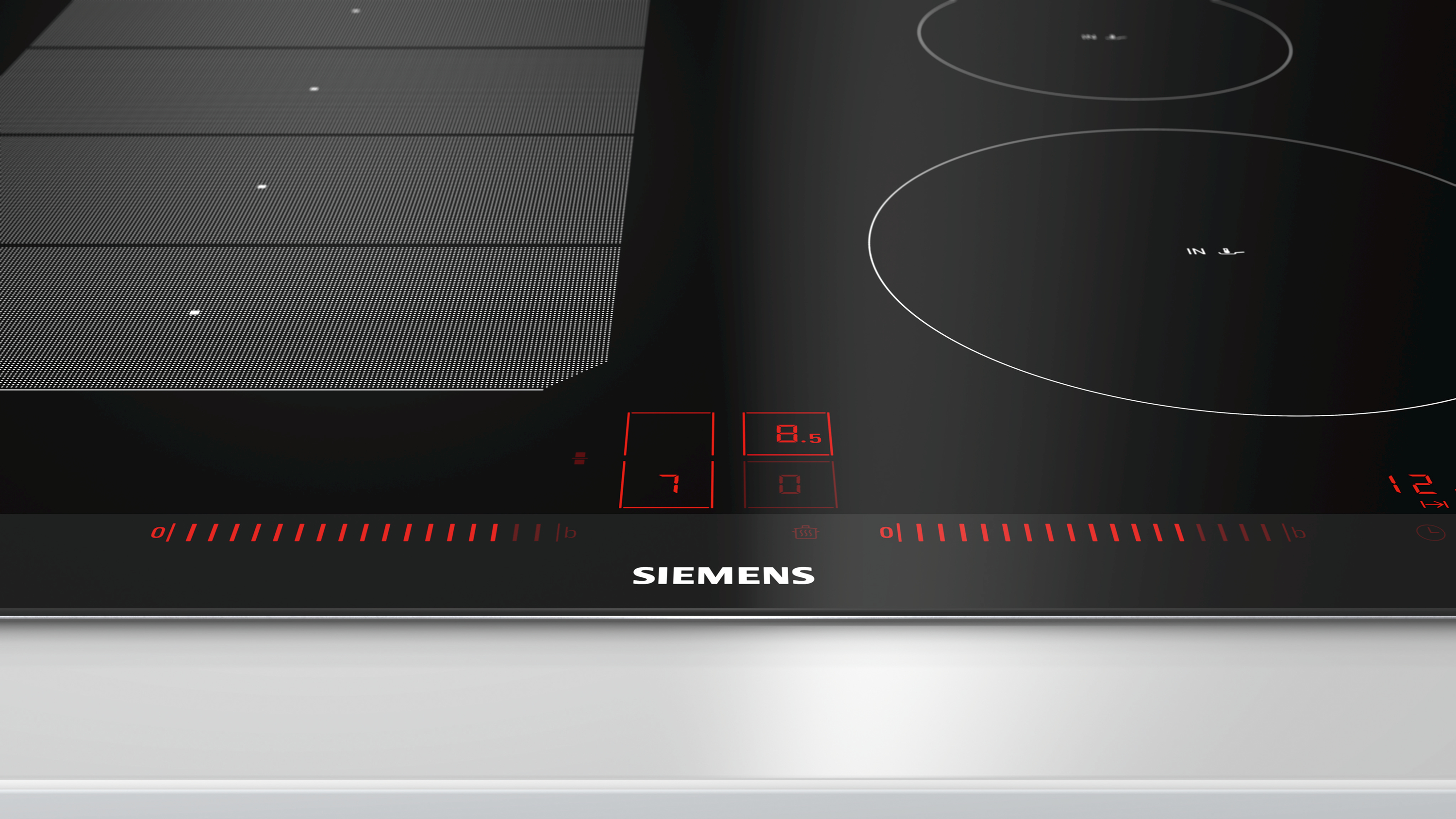 Siemens hob with touch controls and a digital display. A partial view from above.