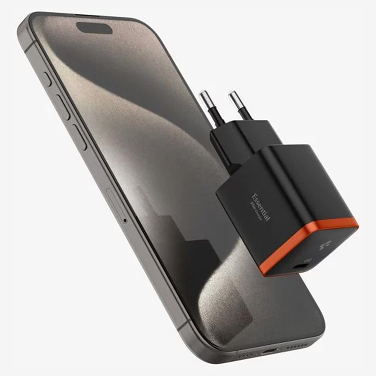 Een zwarte telefoonlader met een oranje accent aangesloten op een telefoon.
