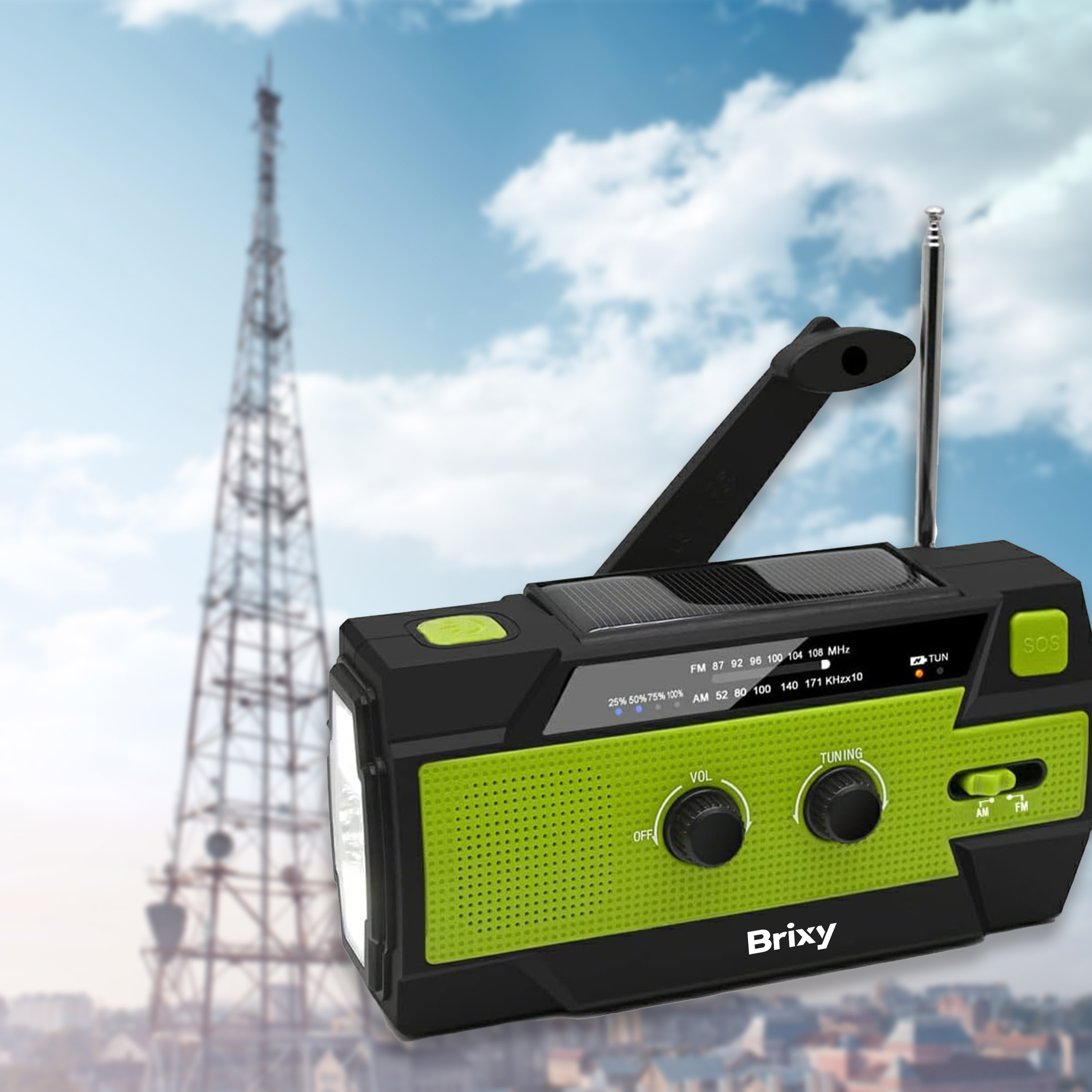 Green and black radio with a solar panel and antenna.  A distant transmission tower is in the background.