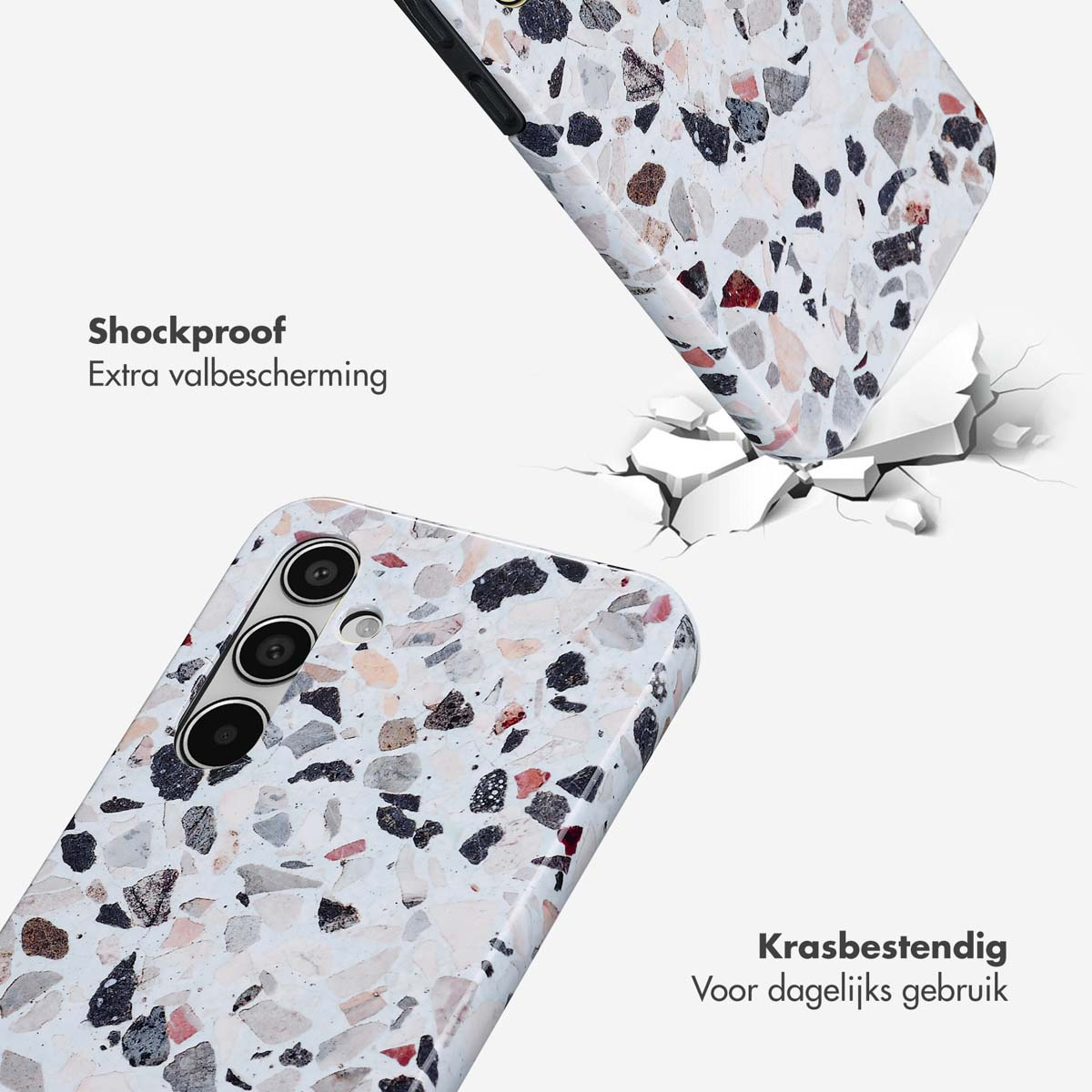 Telefoonhoesje met een witte basis en een zwart en bruin gespikkeld ontwerp, met scheuren.