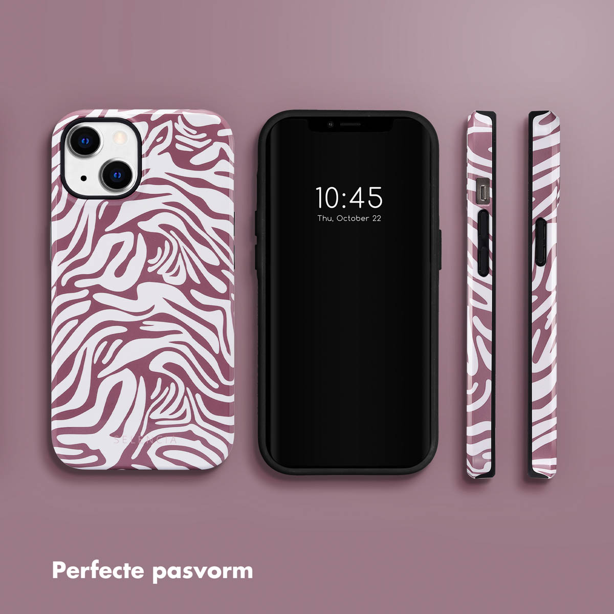 Téléphone avec coque à motif zébré, un téléphone noir et deux coques latérales sur surface violette.