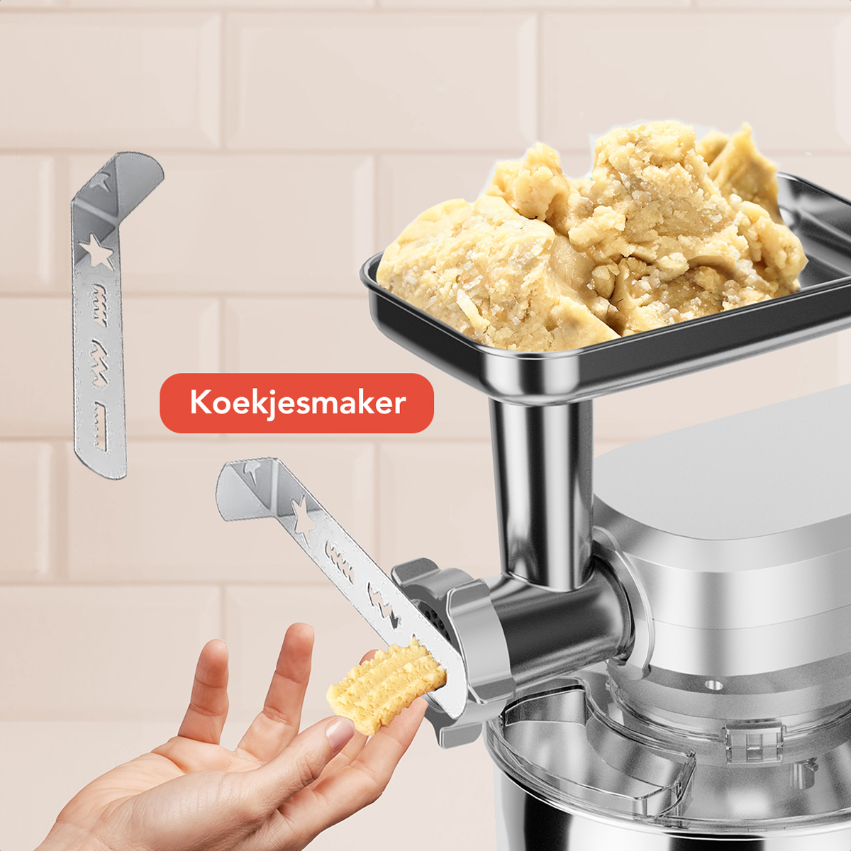 Keukenmixer maakt koekjes met een koekjesmaker. Een hand plaatst deeg.