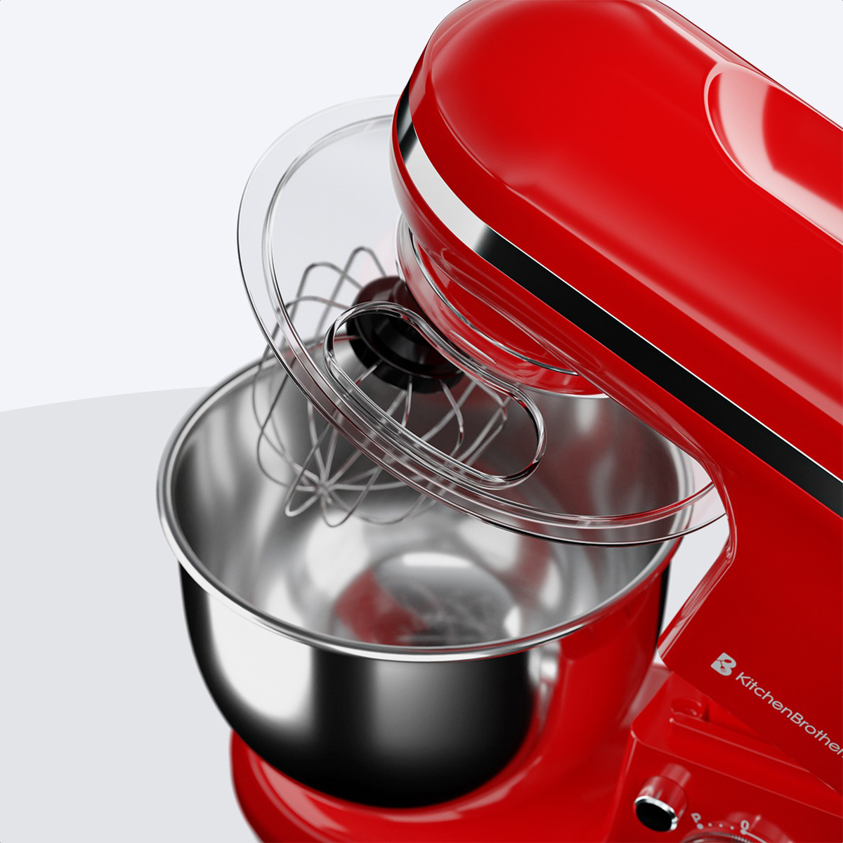 Red stand mixer with bowl and whisk attachment. White background.