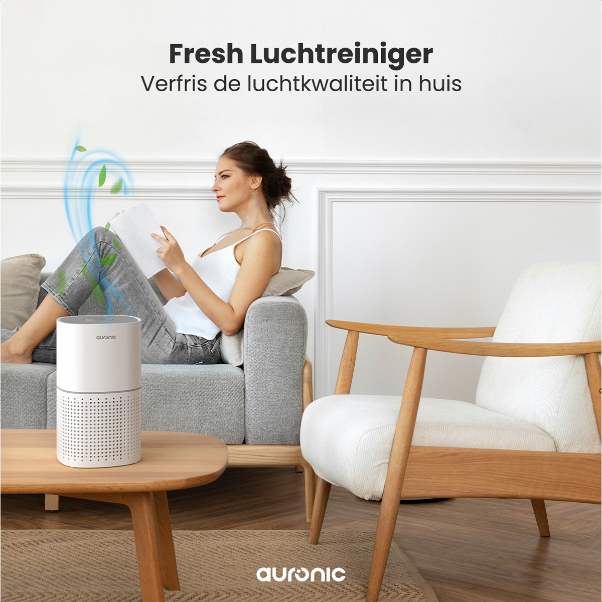 Woman reading by a white air purifier. Text: Fresh air, refresh the air quality in your home.
