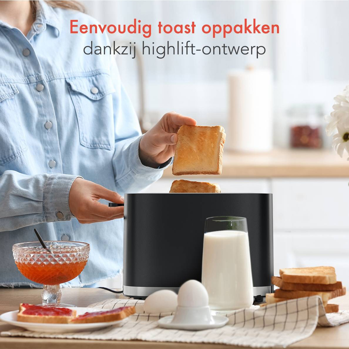 Woman taking out toast from a black toaster. It shows jam, eggs, and milk, on the table.