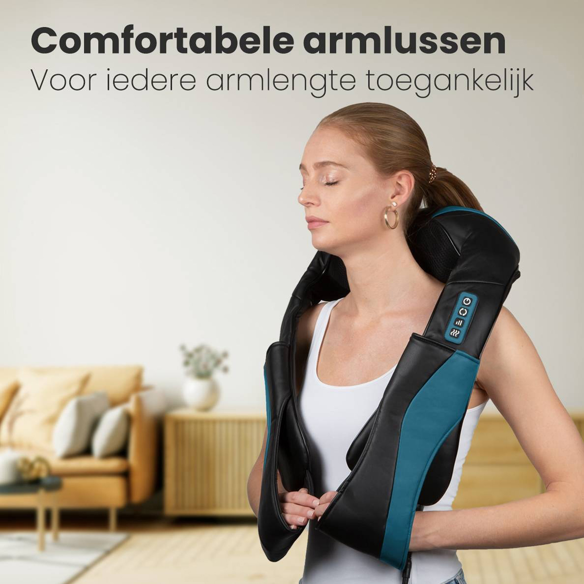Woman wearing a black and teal neck massager. Yellow sofa in background.
