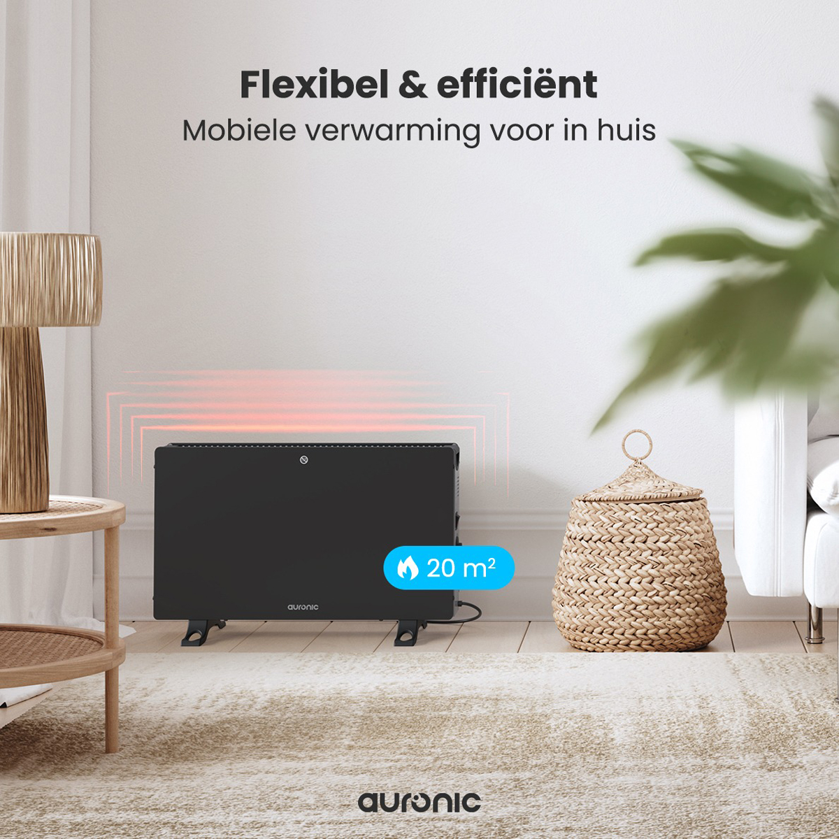 A black heater on a wooden floor, with the word Auronic. A basket and a side table are there.