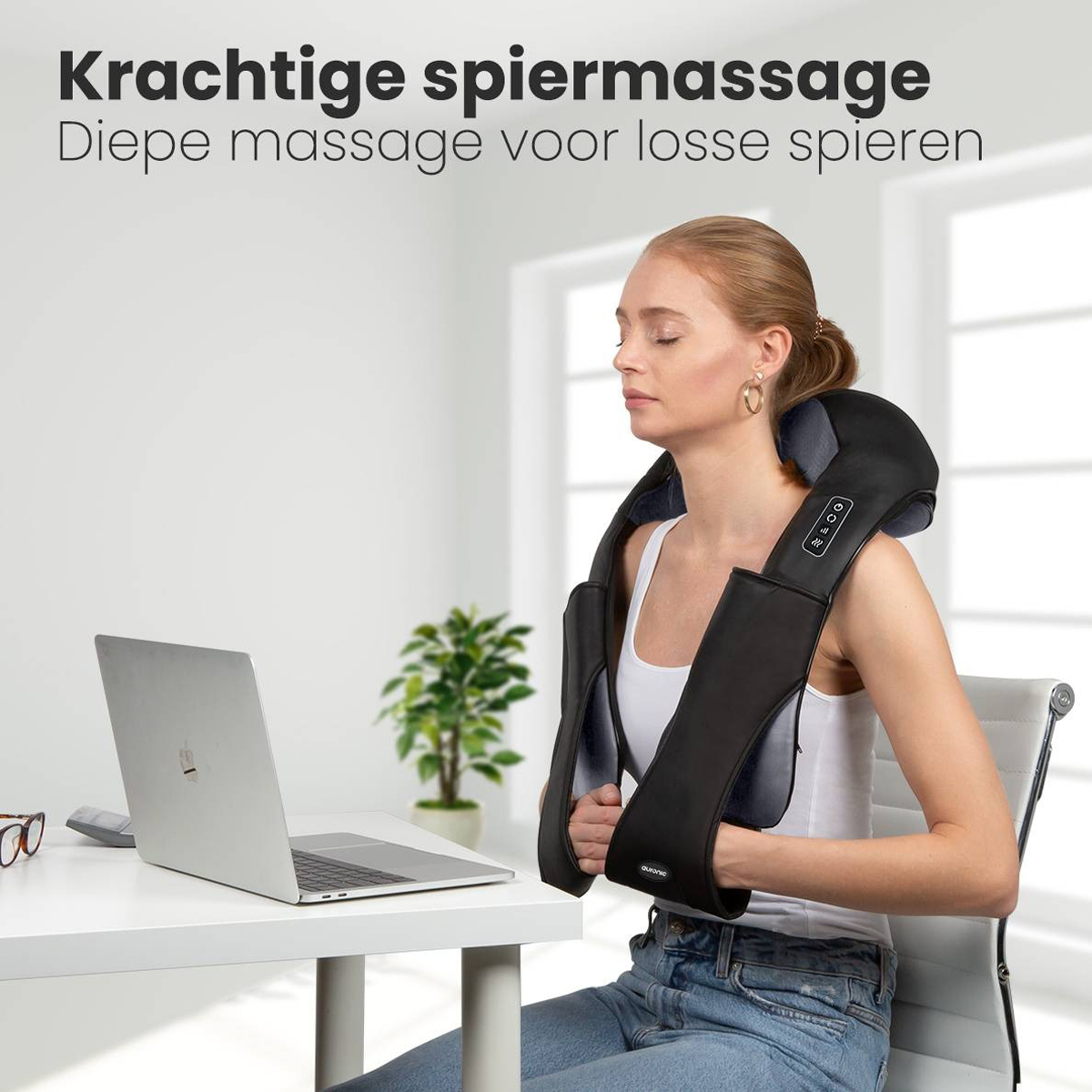 A woman is wearing a massage device. She is sitting at a desk. A laptop is open. Text describes a massage.