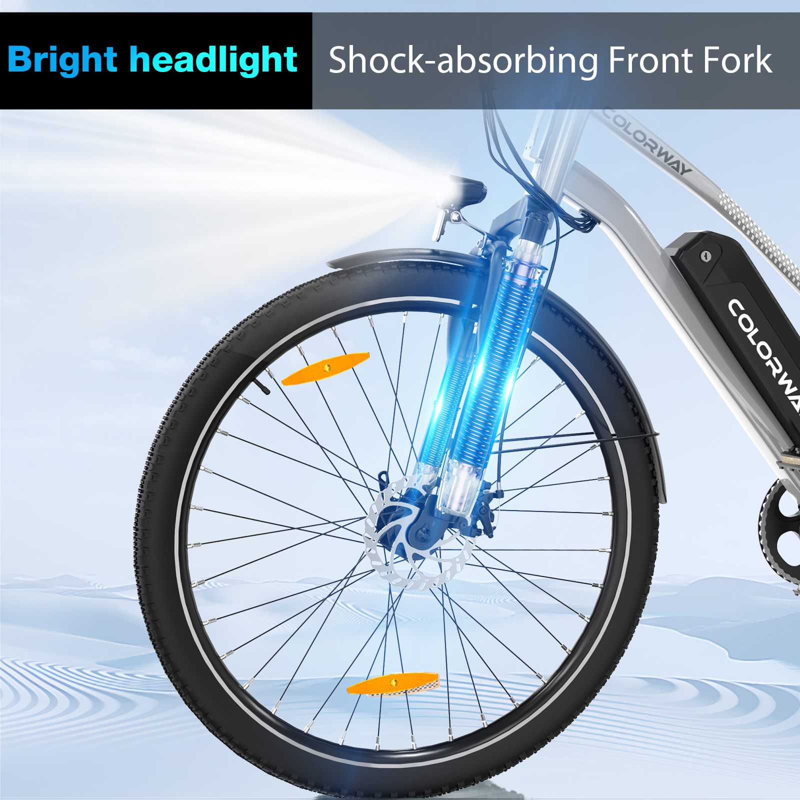 Detail des Vorderrads eines E-Bikes. Das Bild hebt den hellen Scheinwerfer und die stoßdämpfende Gabel hervor.