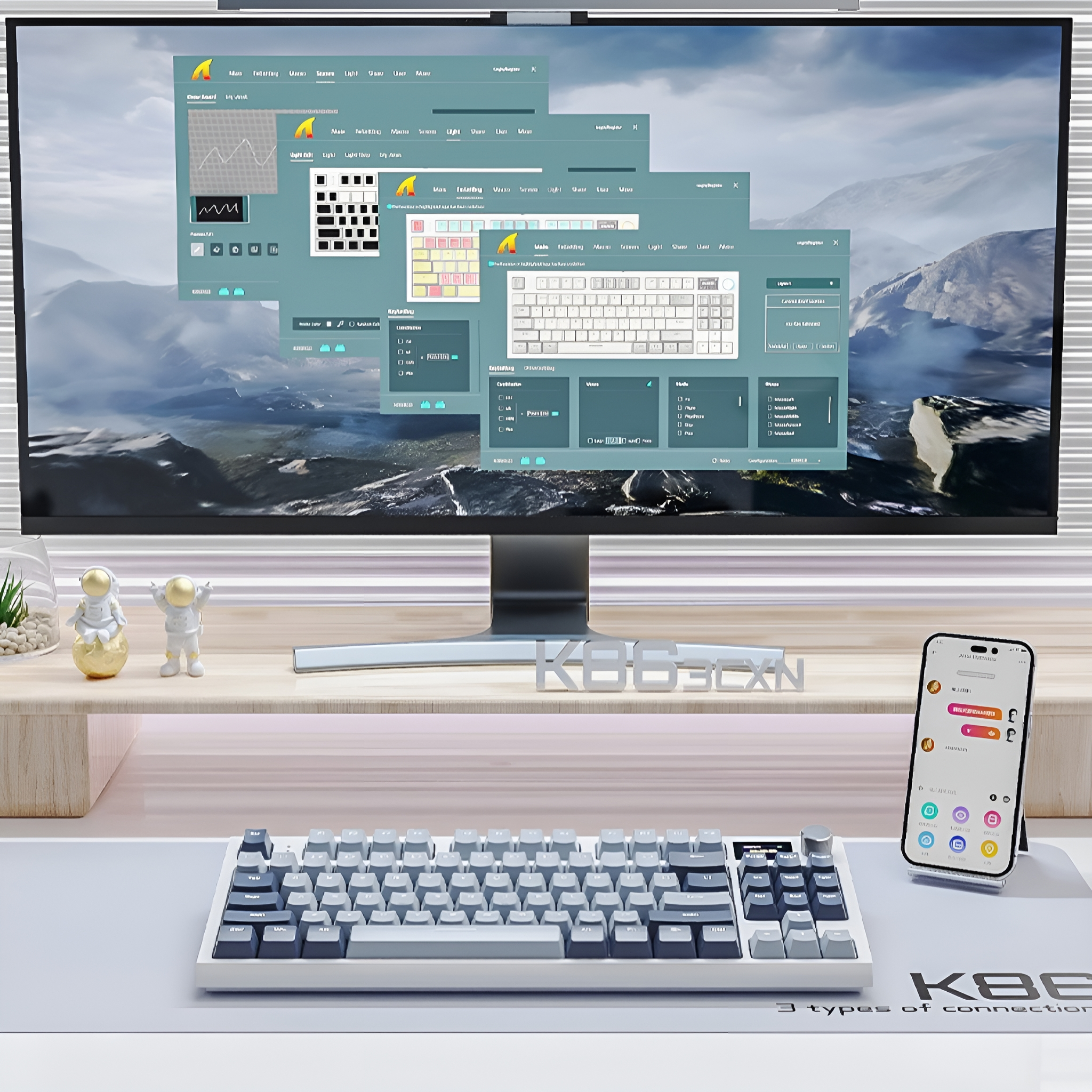 Eine Tastatur und ein Computermonitor mit Softwareoberflächen stehen auf einem Schreibtisch.