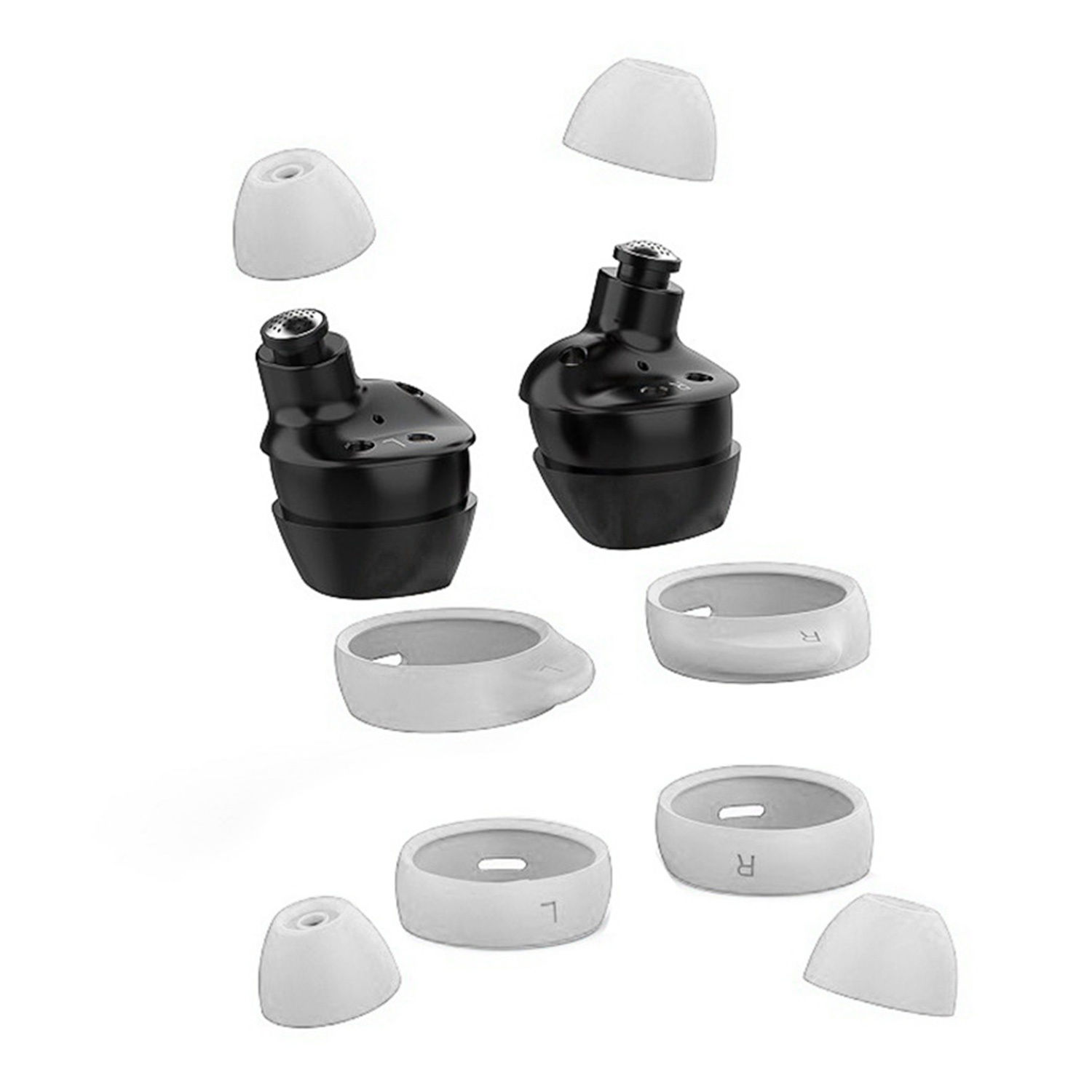 Oordopjes en hun accessoires. Er zijn twee zwarte oordopjes en witte en grijze accessoires.