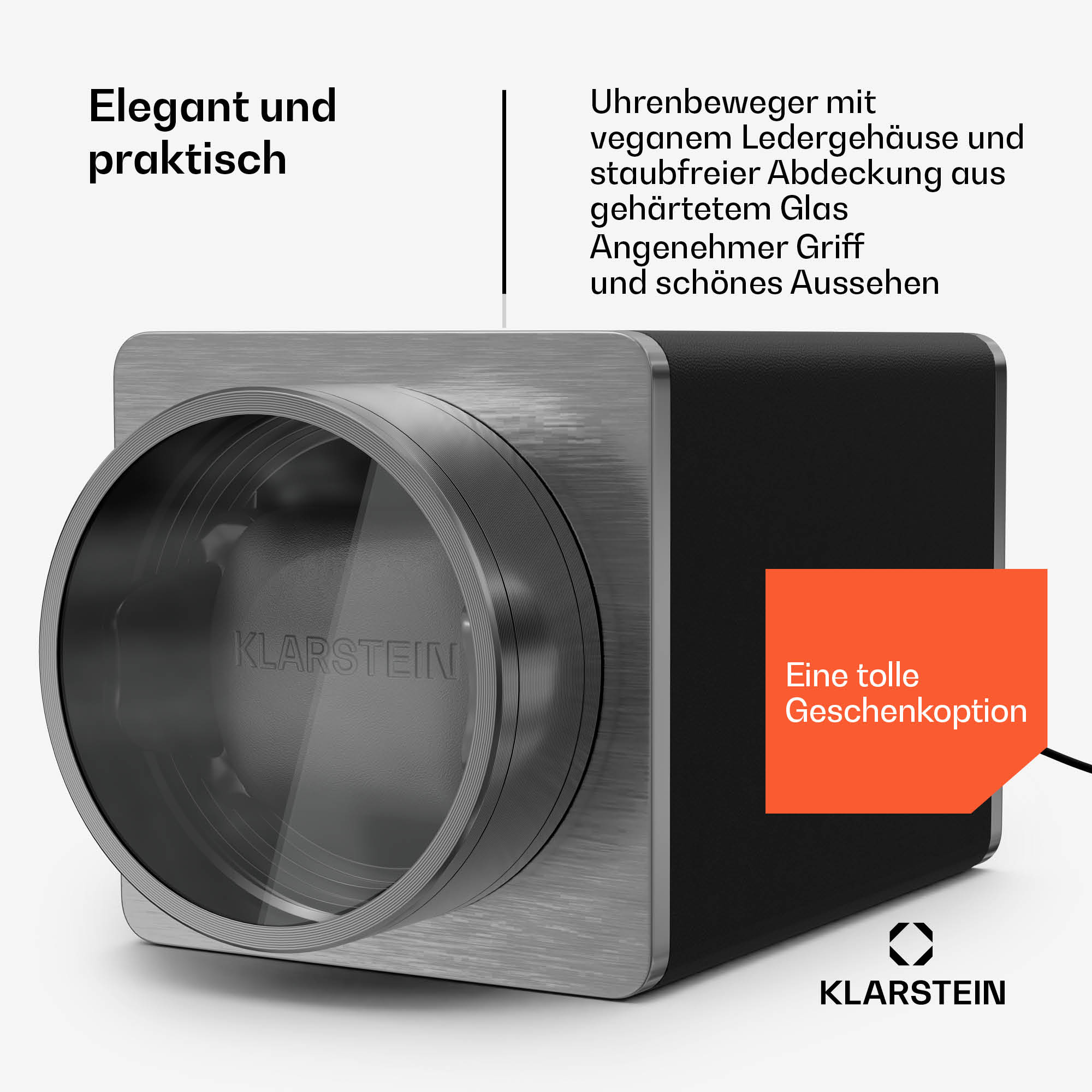Ein Uhrenbeweger. Es ist ein würfelförmiges Gerät mit Glasfenster, Text und Logo.