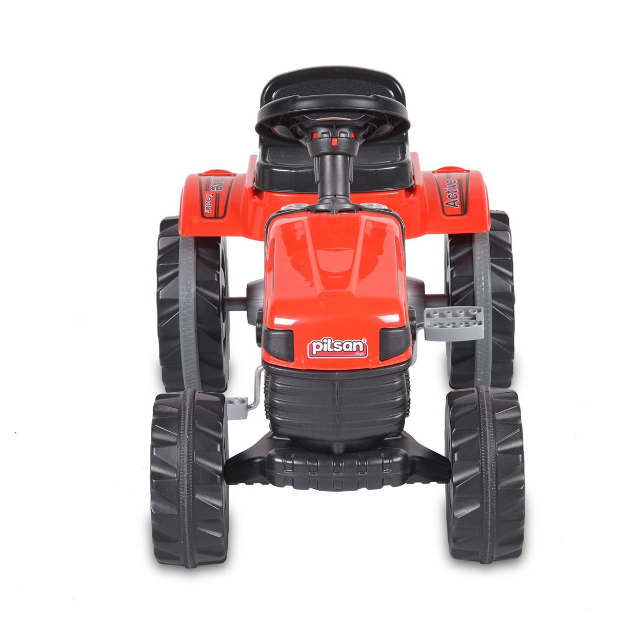 Ein roter und schwarzer Spielzeugtraktor mit großen Reifen, von vorne gesehen.